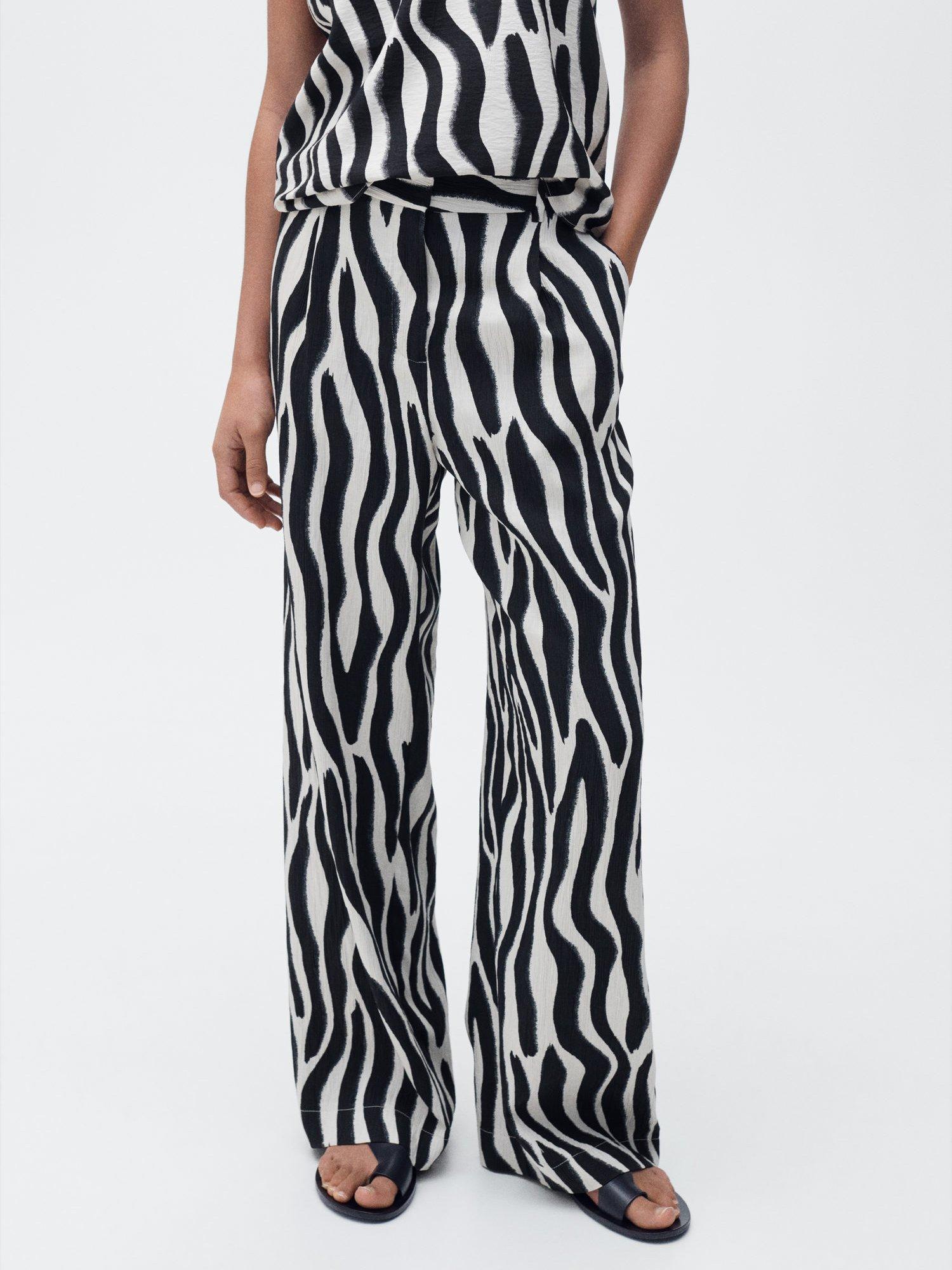 Product image 1 of 7, which shows Mango Nikita Zebra Straight Leg Trousers, Black/White, 6