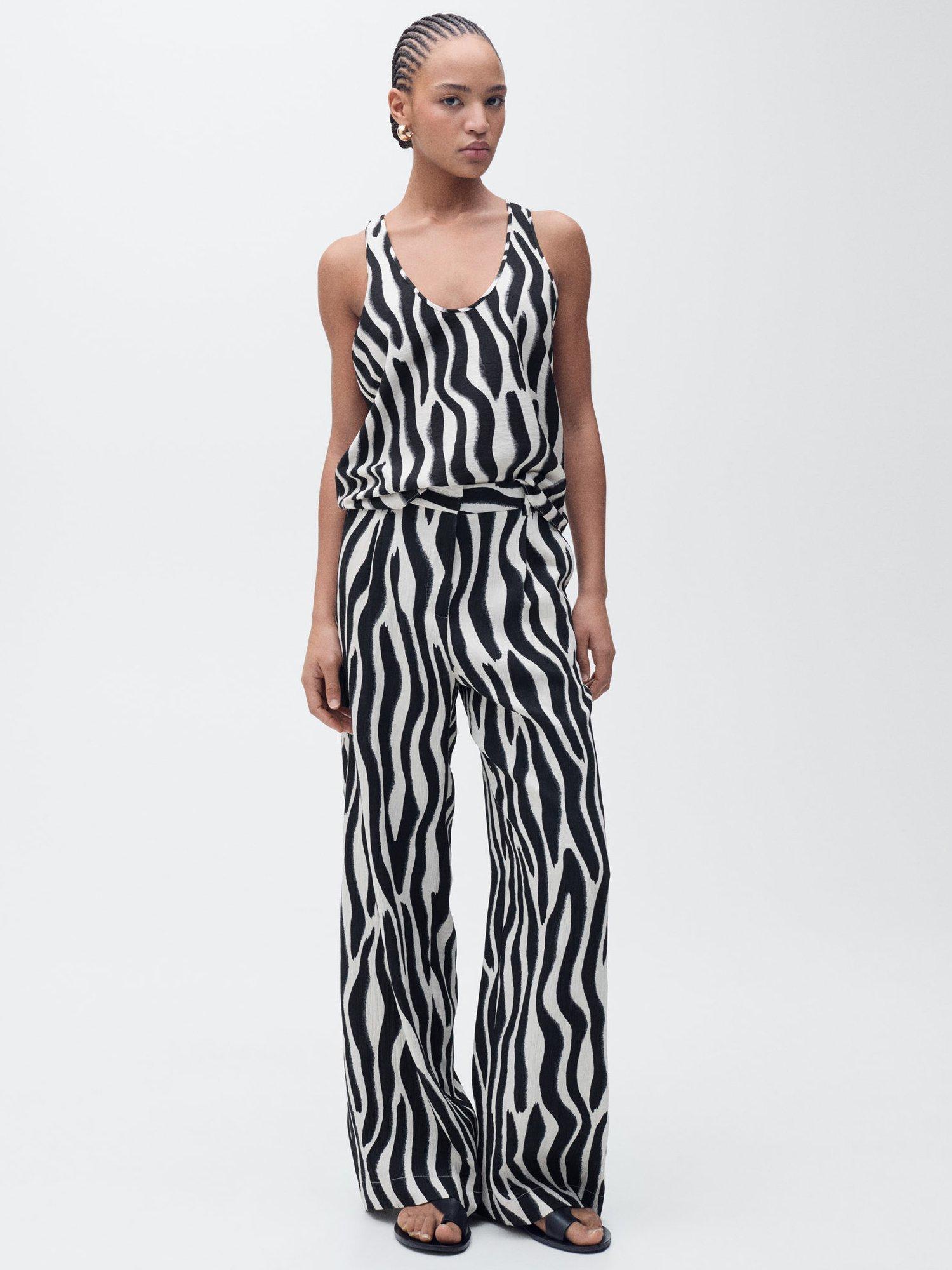 Product image 2 of 7, which shows Mango Nikita Zebra Straight Leg Trousers, Black/White, 6