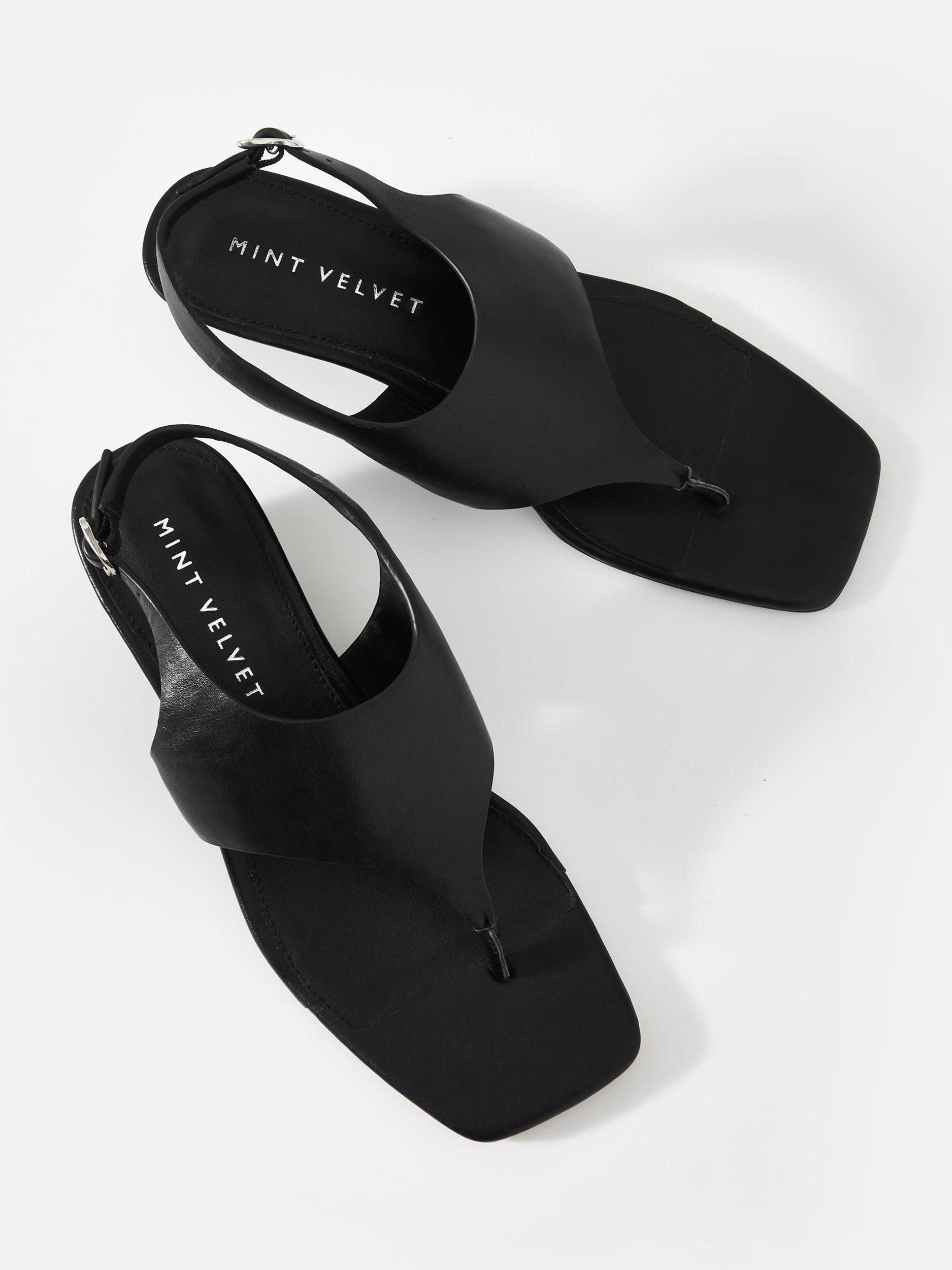 Product image 2 of 3, which shows Mint Velvet Cyra Leather Wedge Heel Flip Flops, Black, 3