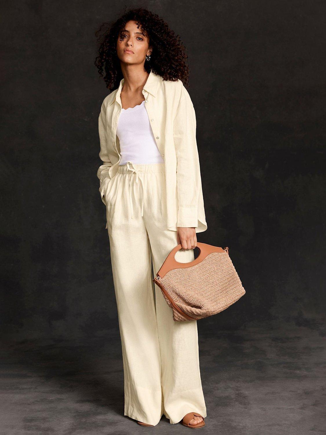 Product image 1 of 7, which shows Mint Velvet Linen Drawstring Wide Leg Trousers, Yellow, S Reg