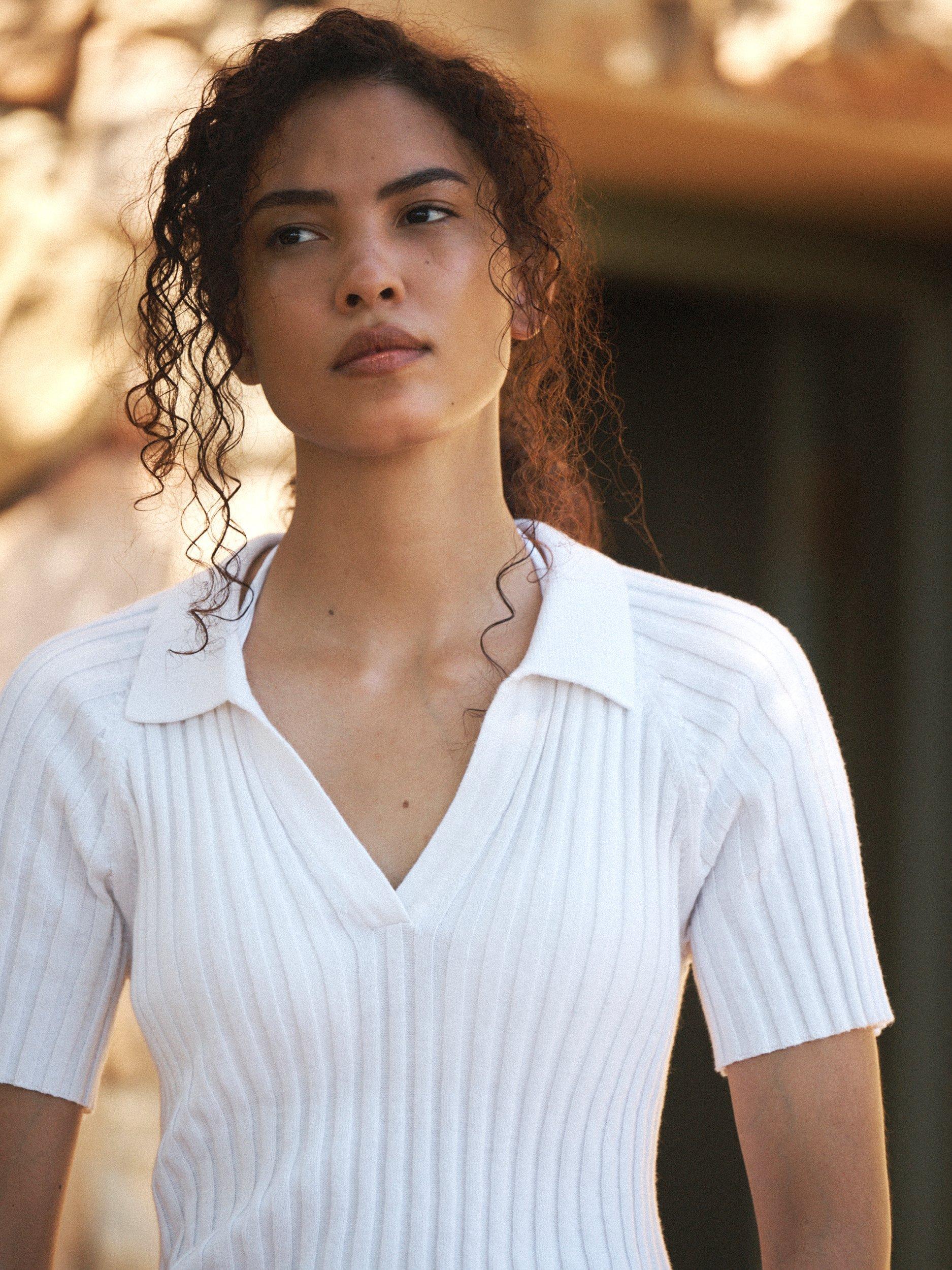 Product image 4 of 6, which shows NRBY Hannah Ribbed V Neck Mixed Blend Tee, Laser White, S