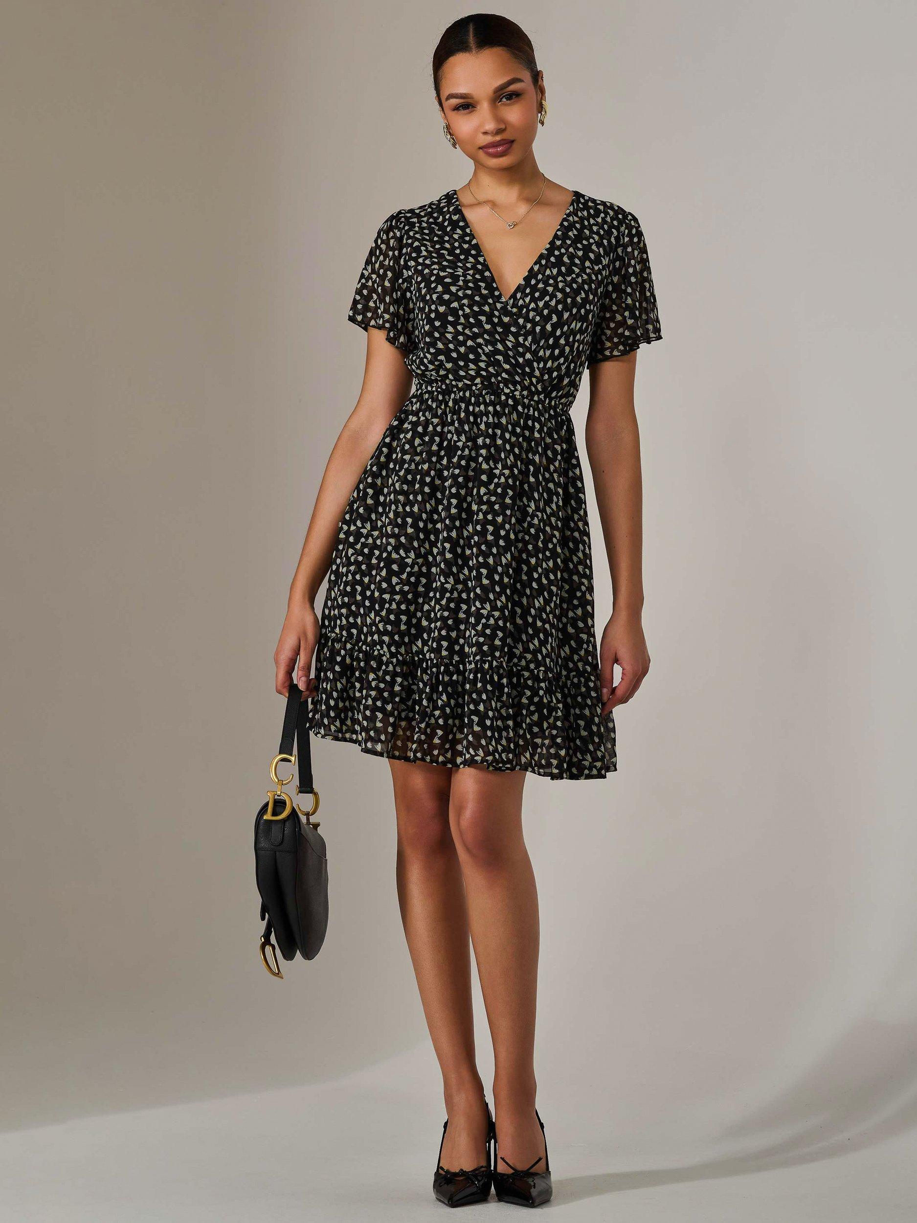 Product image 6 of 7, which shows Jolie Moi Abstract Tie Waist Mini Dress, Black, 8