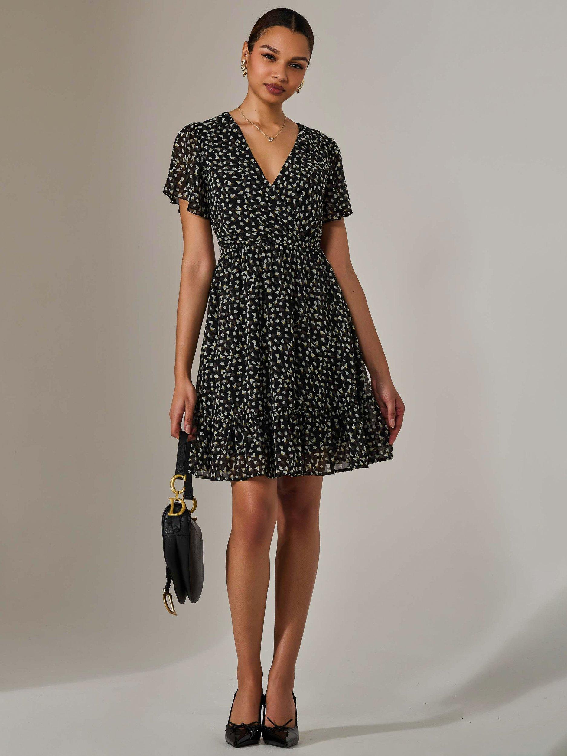 Product image 7 of 7, which shows Jolie Moi Abstract Tie Waist Mini Dress, Black, 8