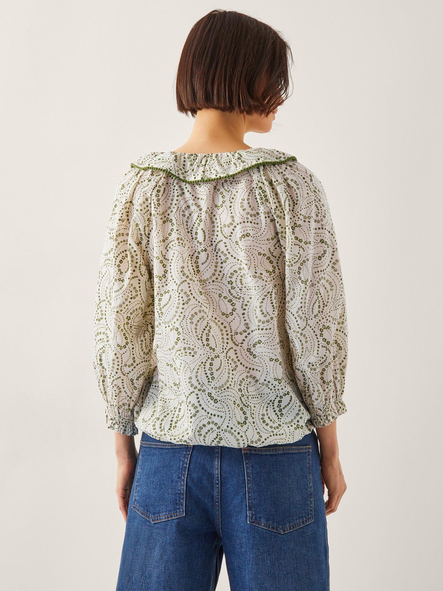 Product image 2 of 5, which shows Monsoon Delma Pintuck Floral Frilly Blouse, Ivory/Green, S