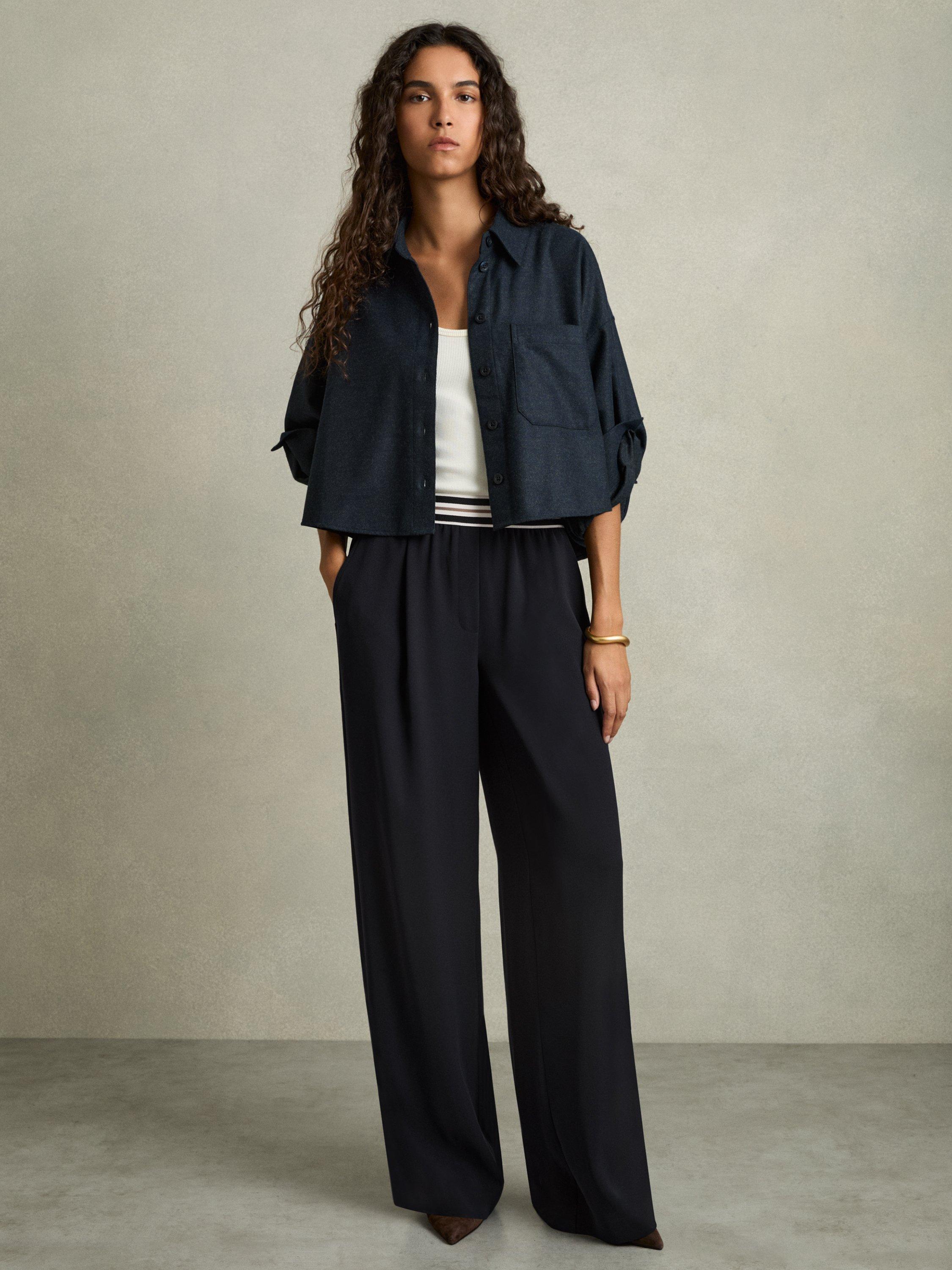 Product image 1 of 5, which shows Reiss Abs Stripe Waist Wide Leg Trousers, Navy, 8R
