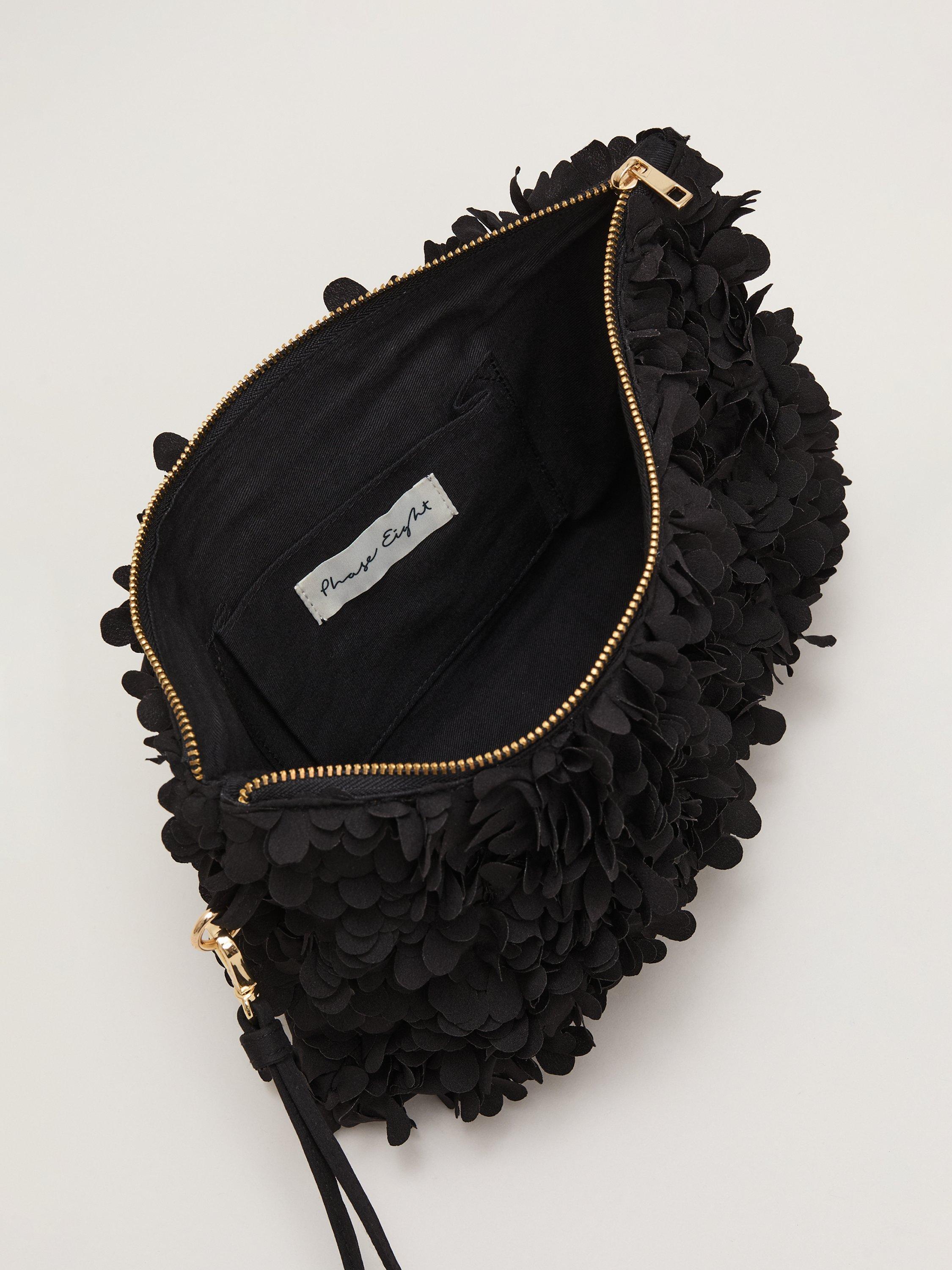 Product image 4 of 7, which shows Phase Eight Textured Petal Clutch Bag, Black