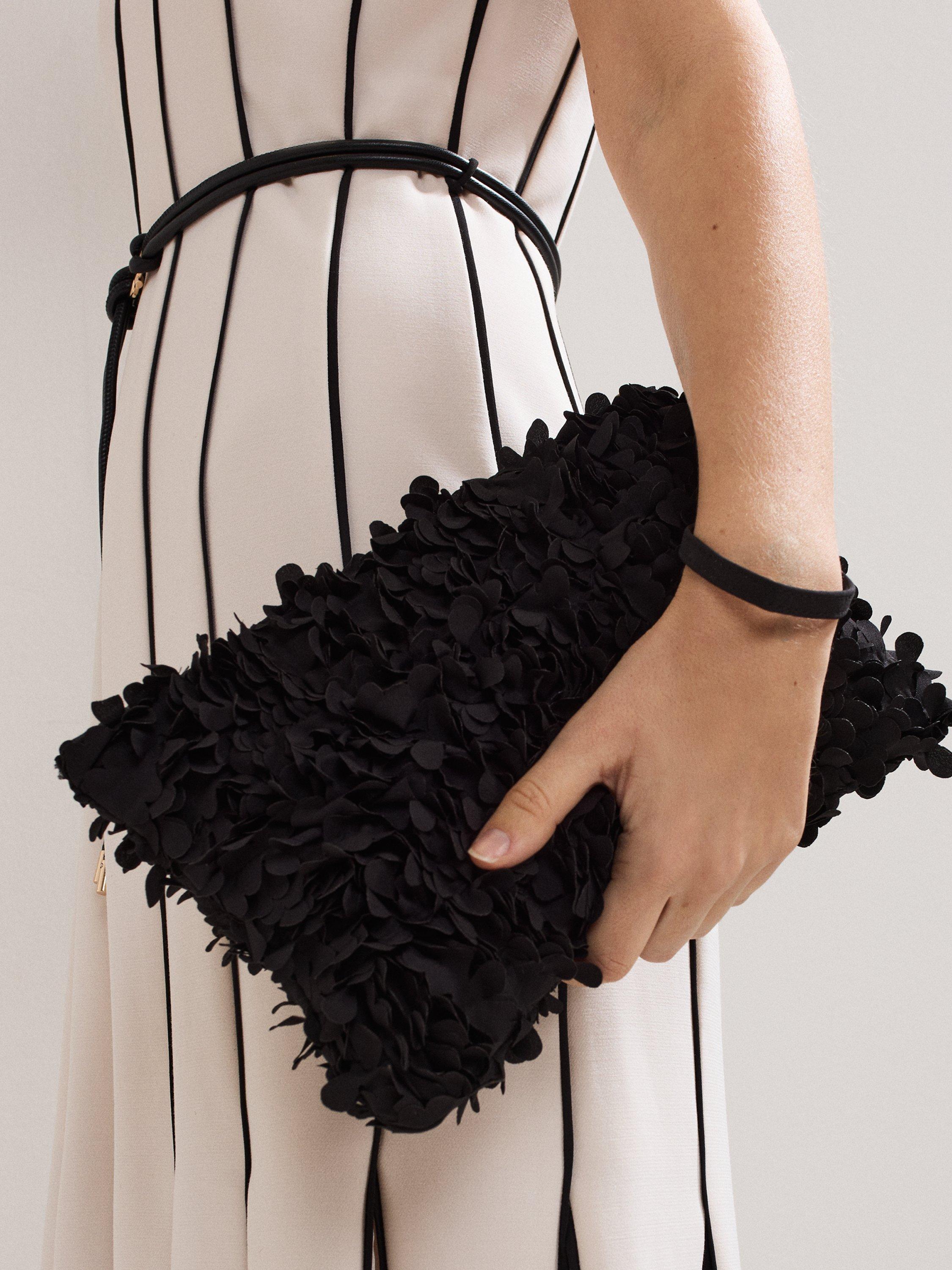 Product image 6 of 7, which shows Phase Eight Textured Petal Clutch Bag, Black