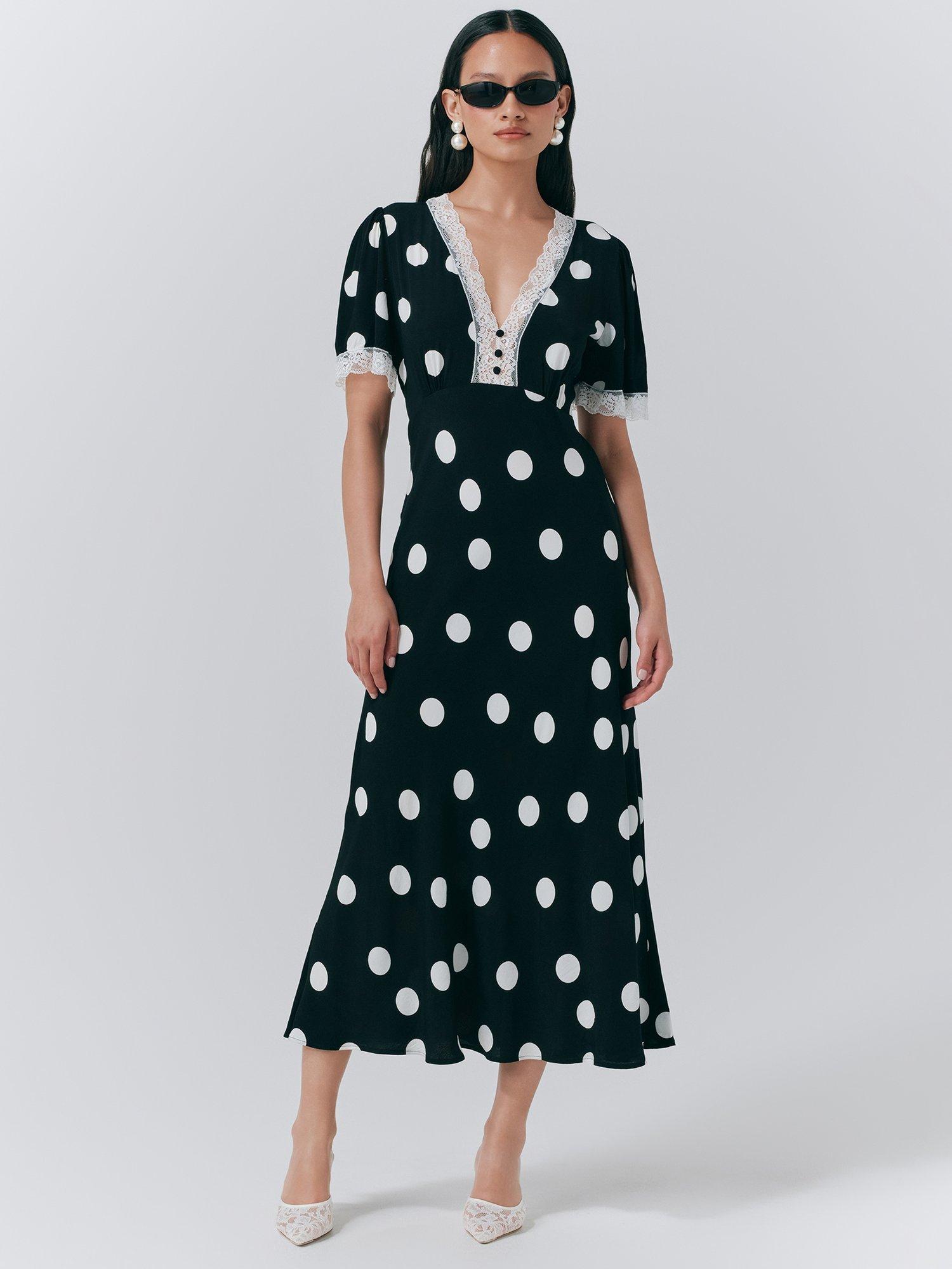 Product image 1 of 5, which shows Ghost Belle Polka Dot Dress, Black/Multi, XS