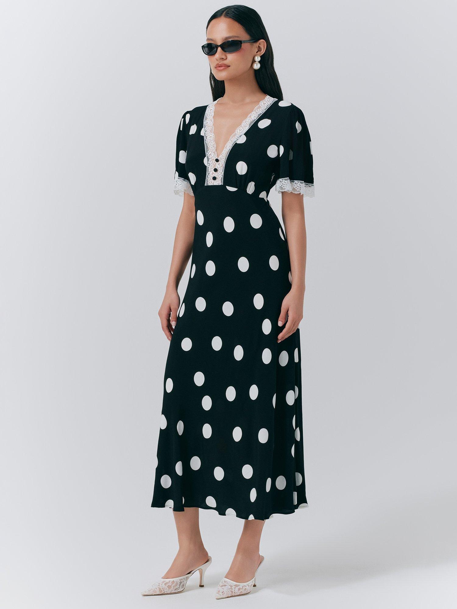 Product image 2 of 5, which shows Ghost Belle Polka Dot Dress, Black/Multi, XS