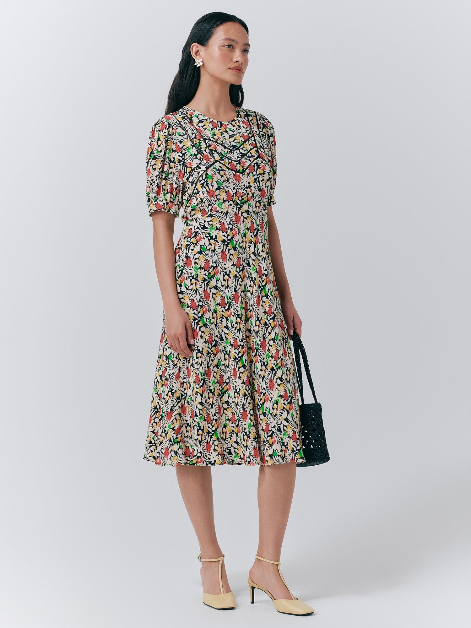 Product image 2 of 5, which shows Ghost Dotty Puff Sleeve Floral Dress, Black/Multi, XS