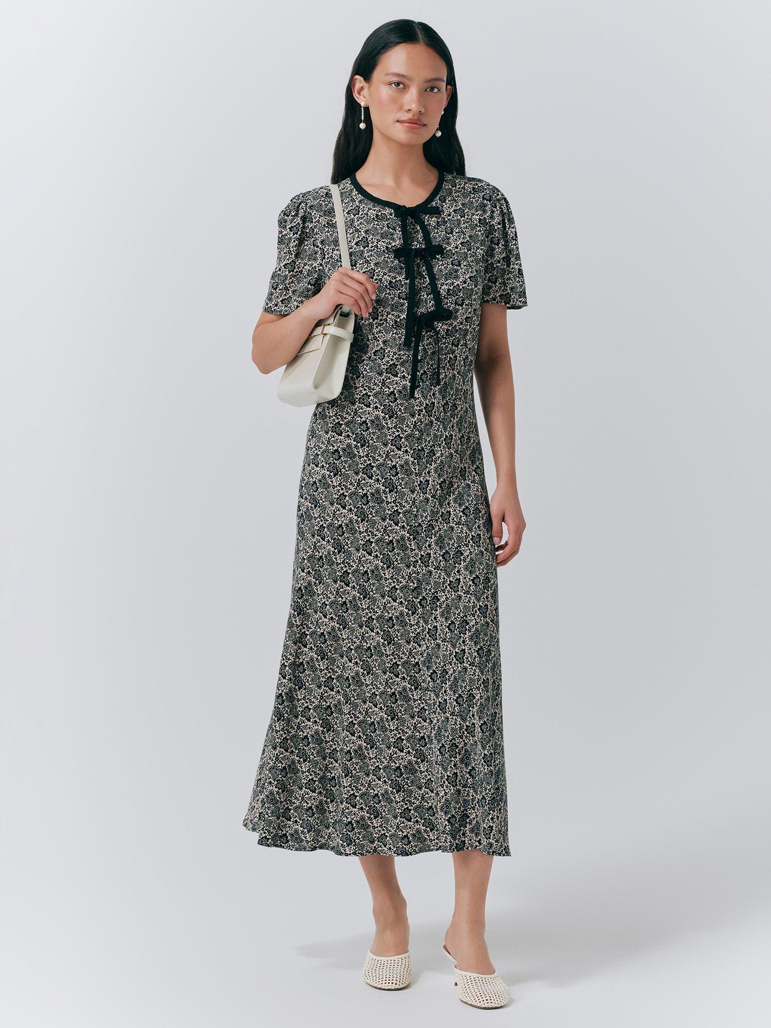 Product image 1 of 5, which shows Ghost Maree Short Sleeve Floral Midi Dress, Black/Multi, L