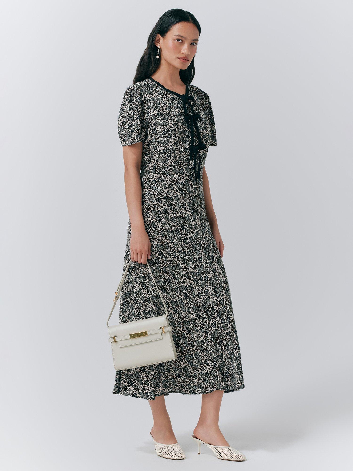 Product image 2 of 5, which shows Ghost Maree Short Sleeve Floral Midi Dress, Black/Multi, L