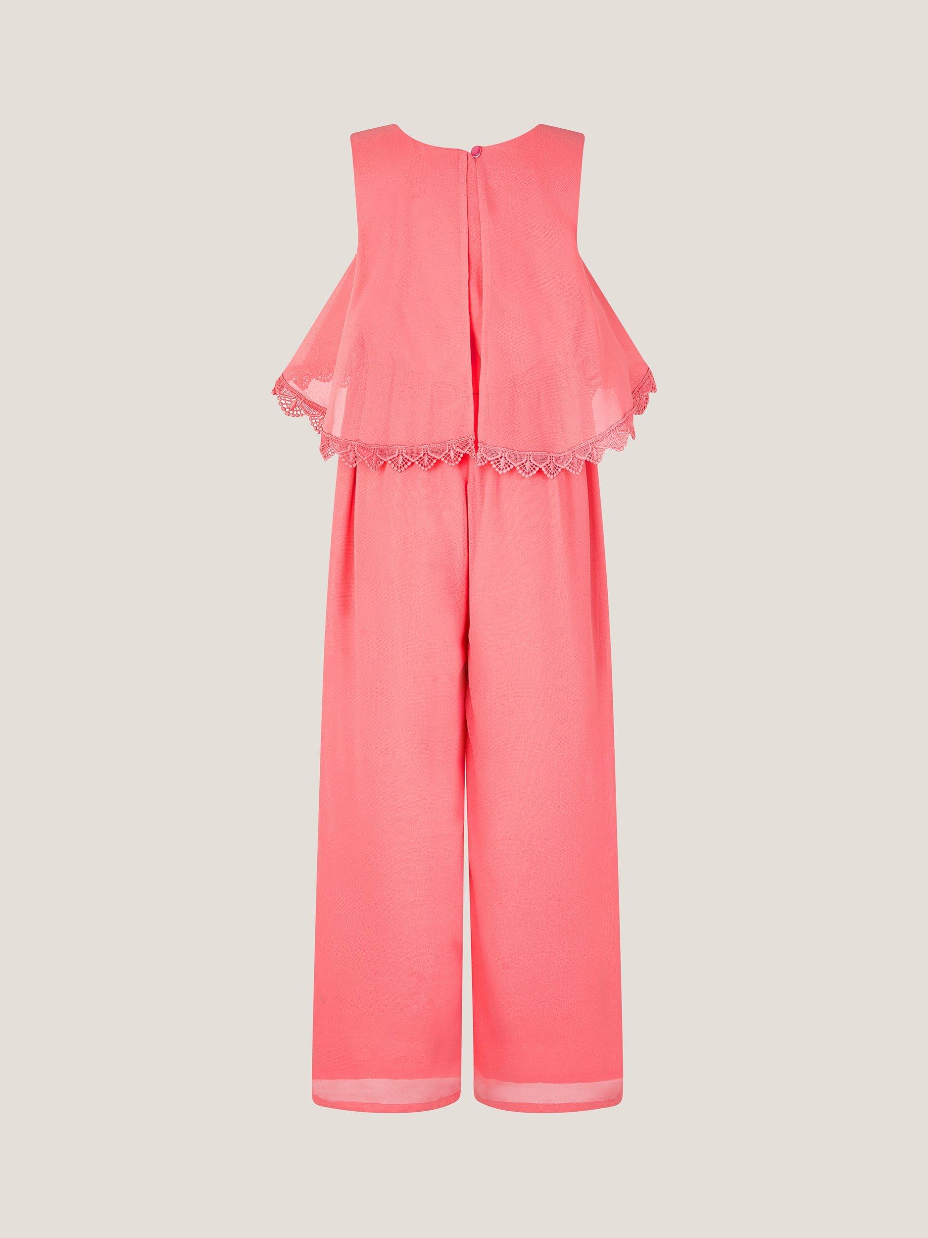 Product image 2 of 3, which shows Monsoon Kids' Leia Lace Trim Tier Playsuit, Coral, 3 years