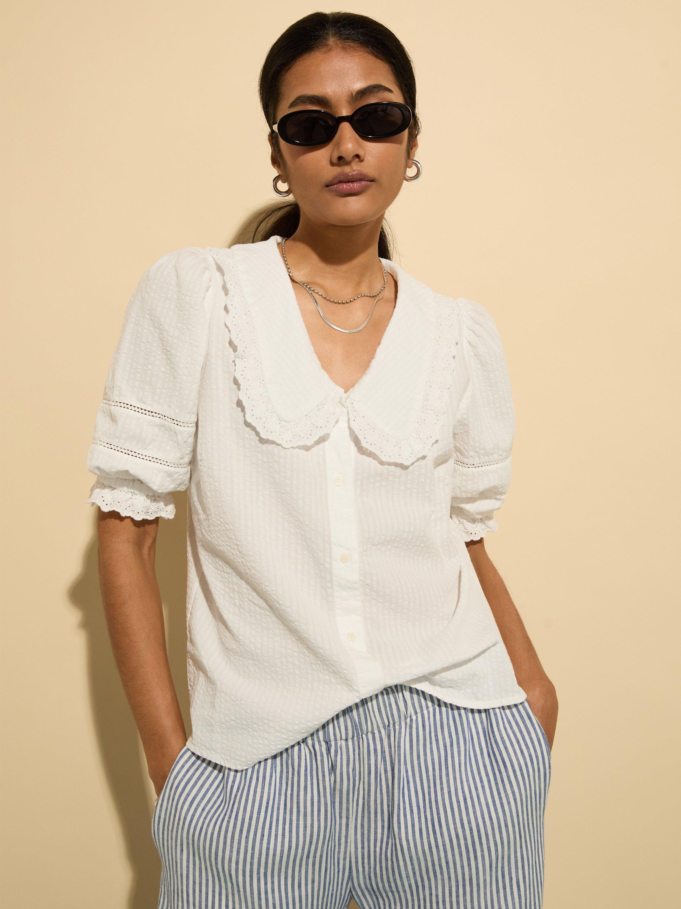 Product image 1 of 6, which shows Baukjen Marti Broderie Anglaise Blouse, Soft White, 6