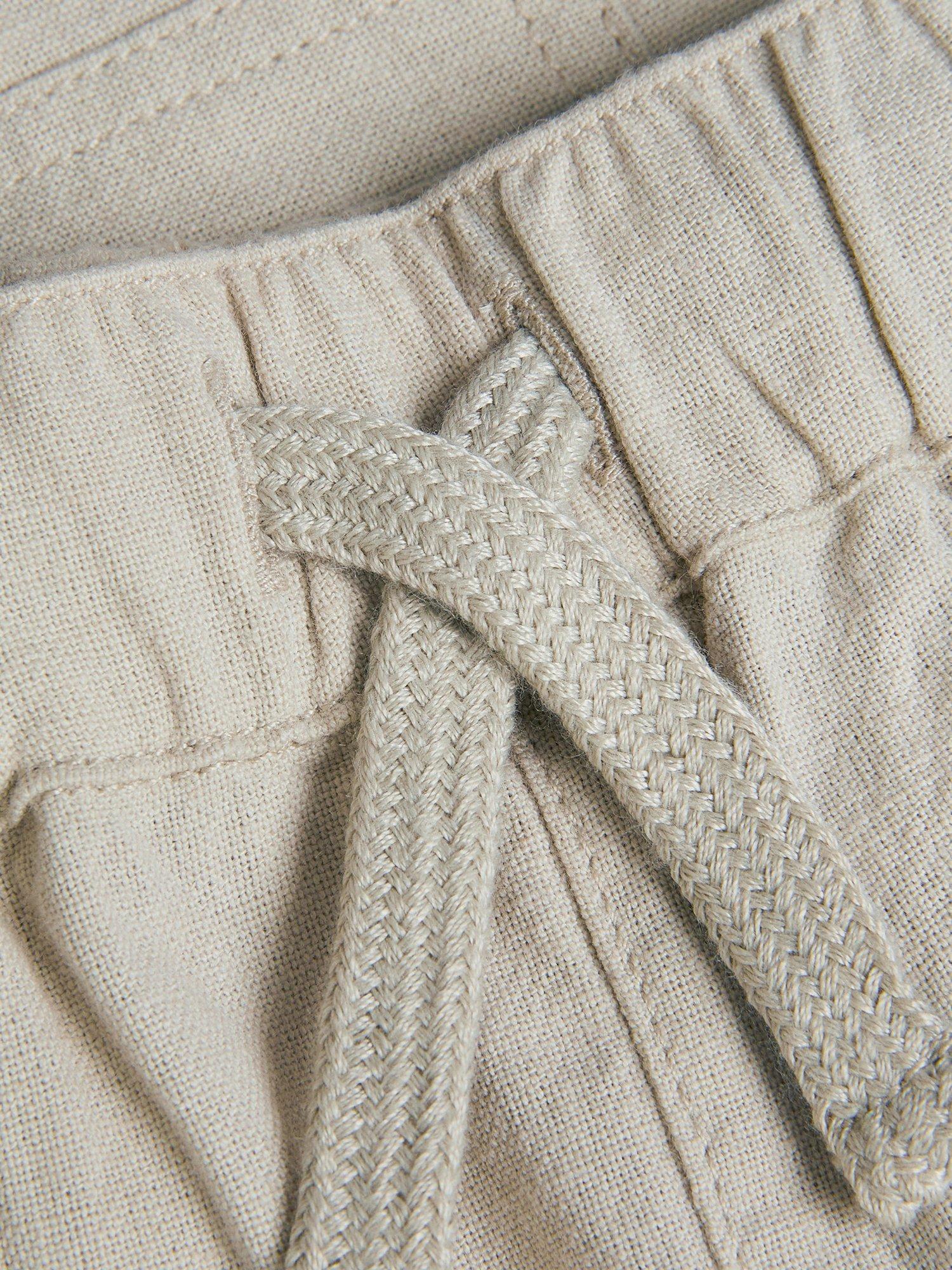 Product image 3 of 3, which shows Monsoon Kids' Drawstring Shorts, Stone, 2-3 years