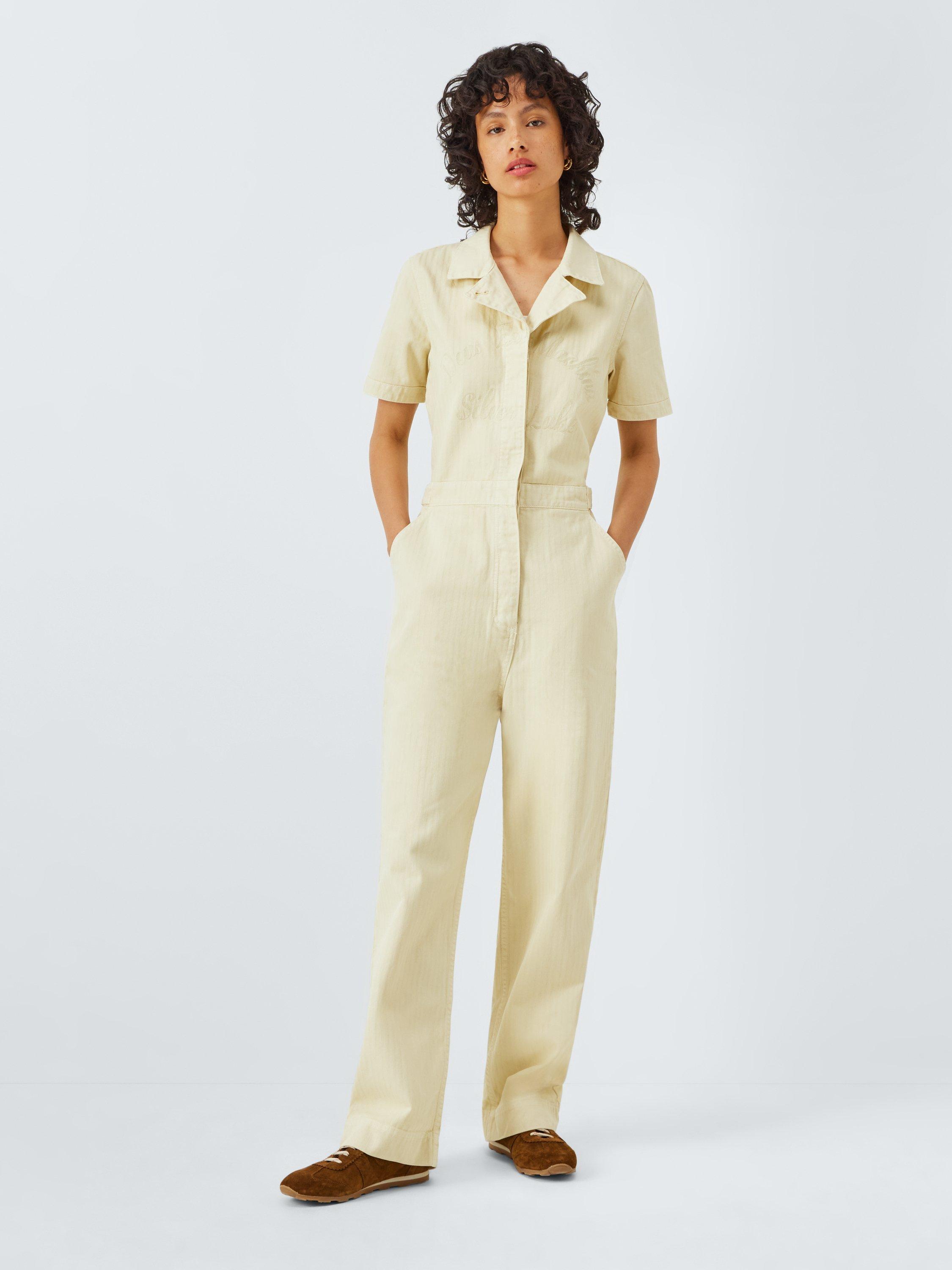 Product image 1 of 6, which shows Deus ex Machina Short Sleeve Cotton Jumpsuit, Natural, XS