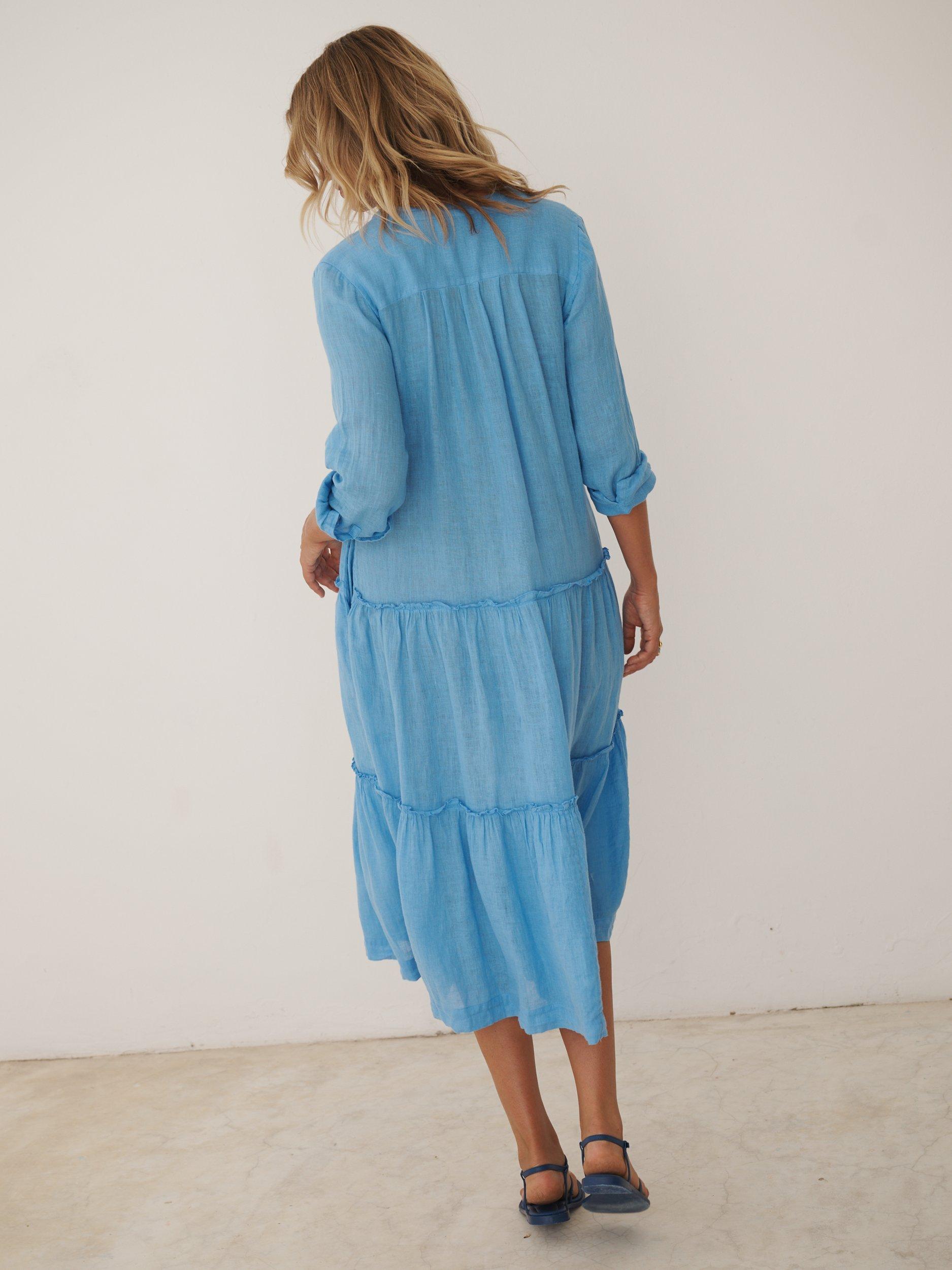 Product image 7 of 9, which shows NRBY X BOYD Braga Linen Tiered Midi Dress, Mid Blue, XS