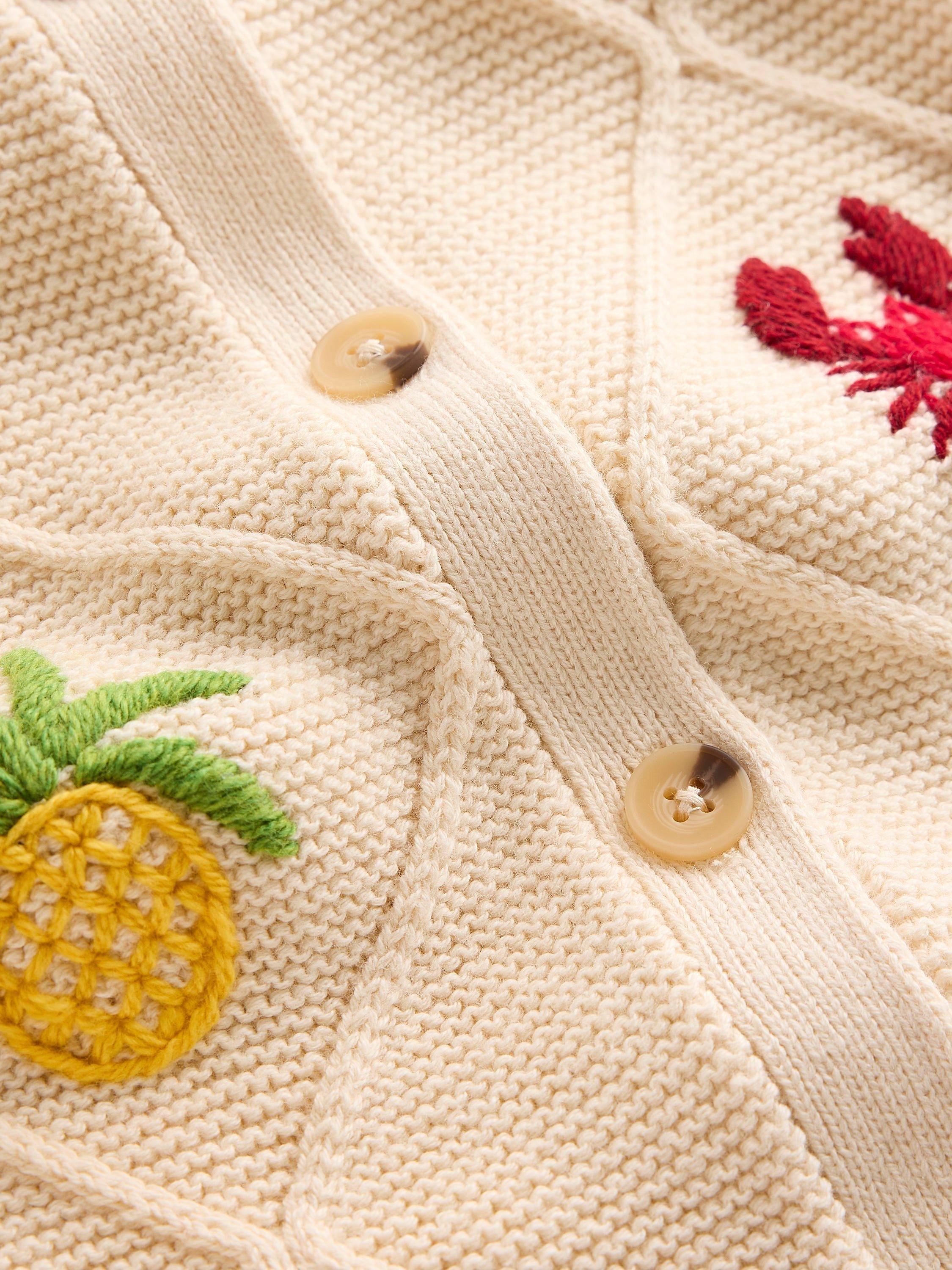 Product image 6 of 6, which shows Boden Tropical Embroidered Cotton Knit Short Sleeve Cardigan, Ivory, XS