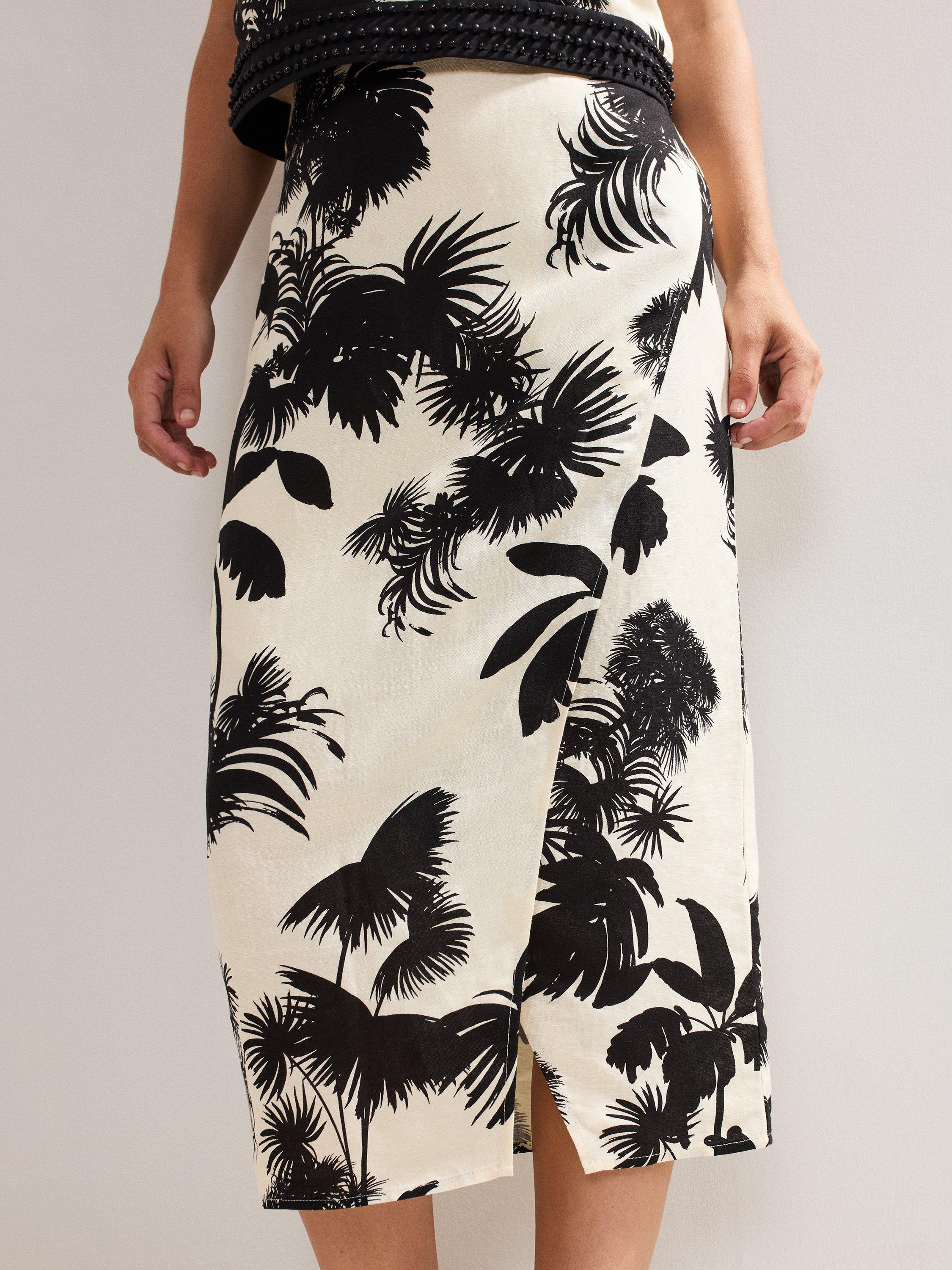 Product image 4 of 8, which shows Phase Eight Vittoria Linen Blend Leaf Print Skirt, Black/Ivory, 8