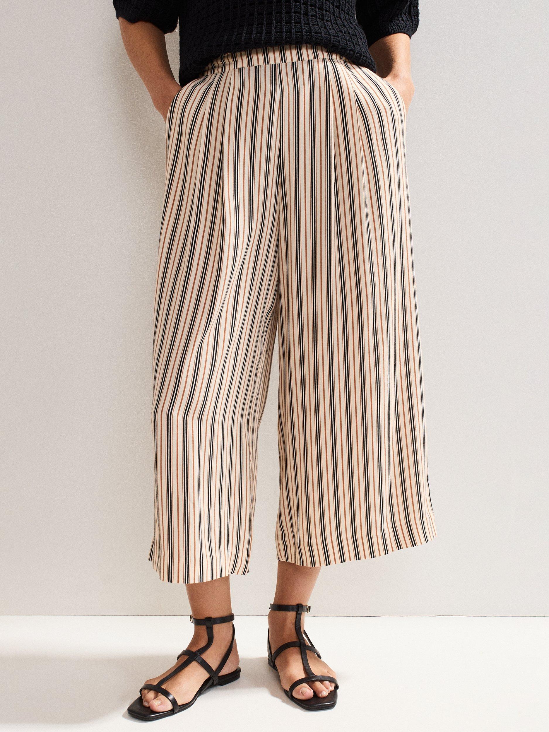 Product image 1 of 7, which shows Phase Eight Malaya Stripe Print Culotte Trousers, Black/Ivory, 8