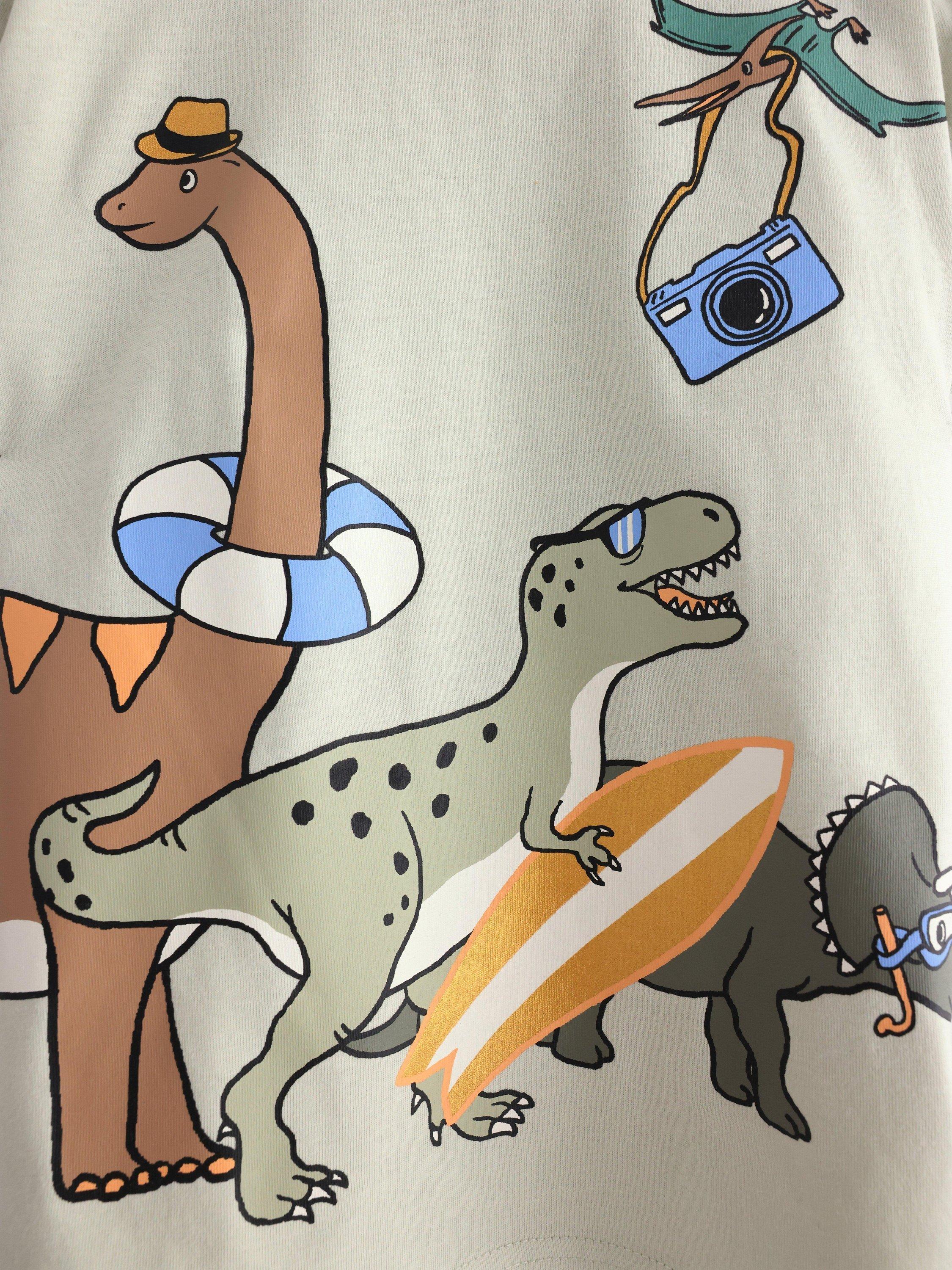 Product image 6 of 6, which shows Lindex Kids' Cotton Dinosaur Print Short Sleeve T-Shirt, Light Dusty Green, 18-24 months