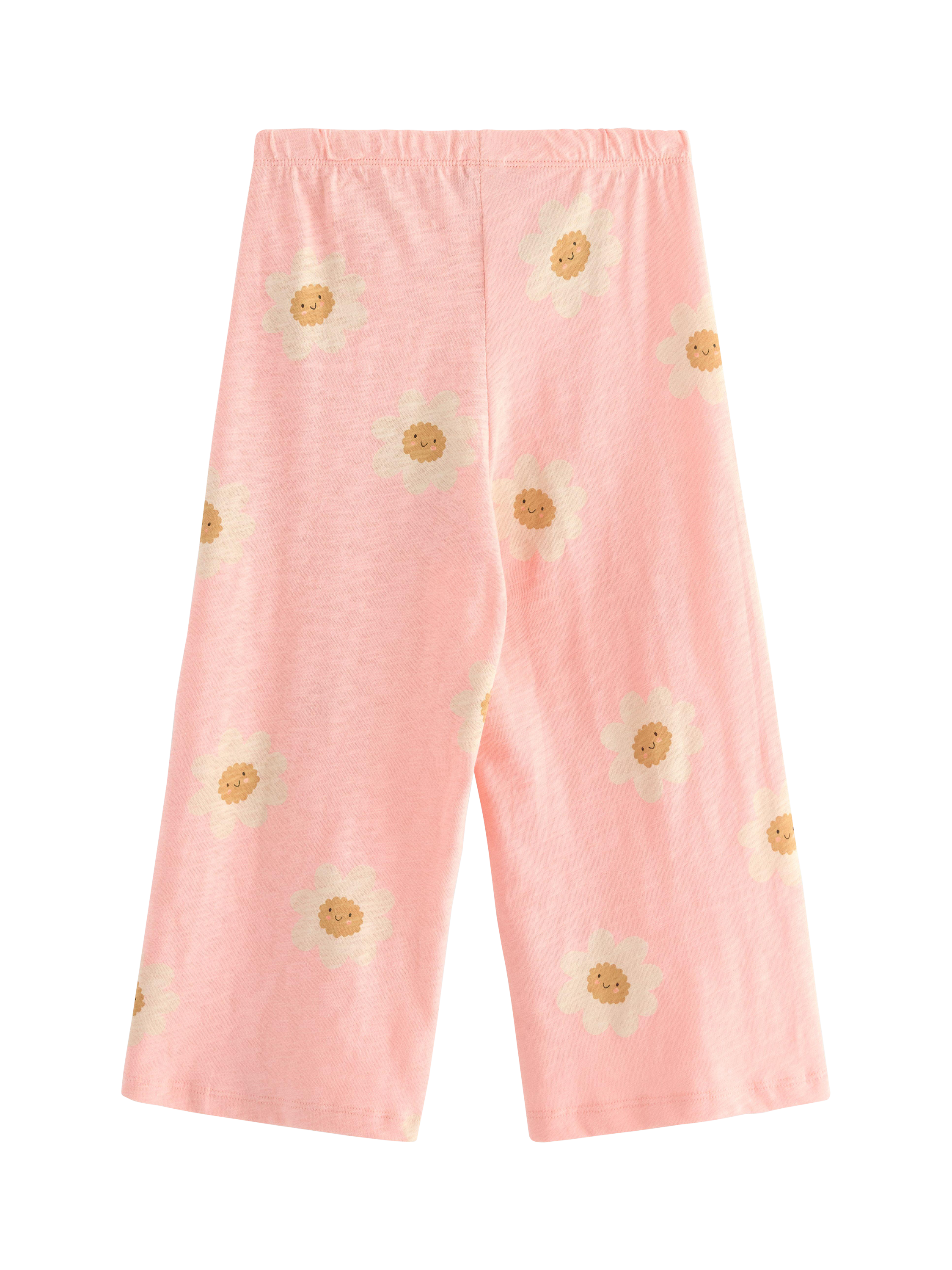 Product image 2 of 3, which shows Lindex Kids' Cotton Jersey Floral Trousers, Light Pink, 6-7 years