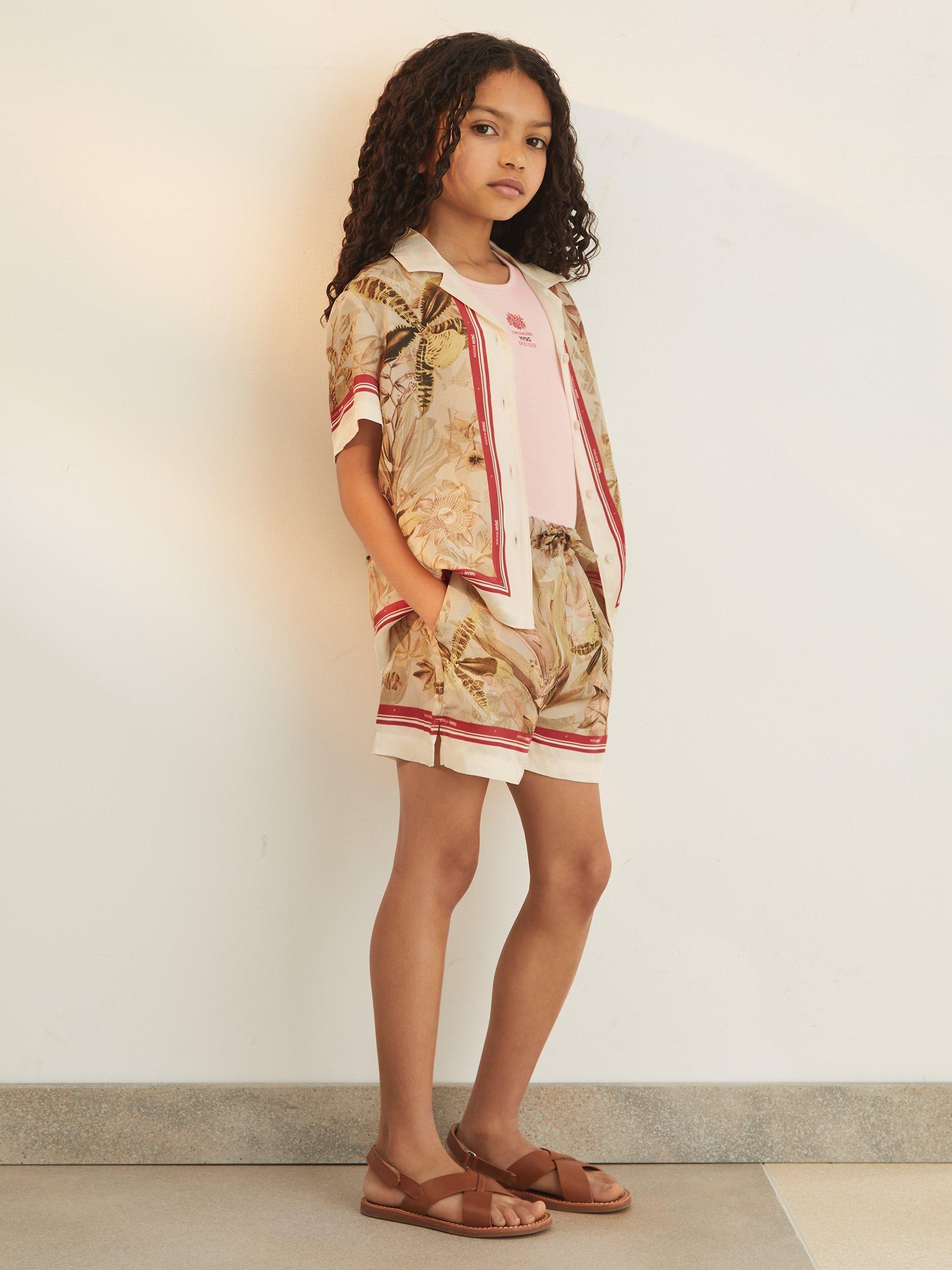 Product image 1 of 5, which shows Reiss New York Botanical Gardens Kids' Sammie Botanical Print Shorts, Khaki, 5-6 years