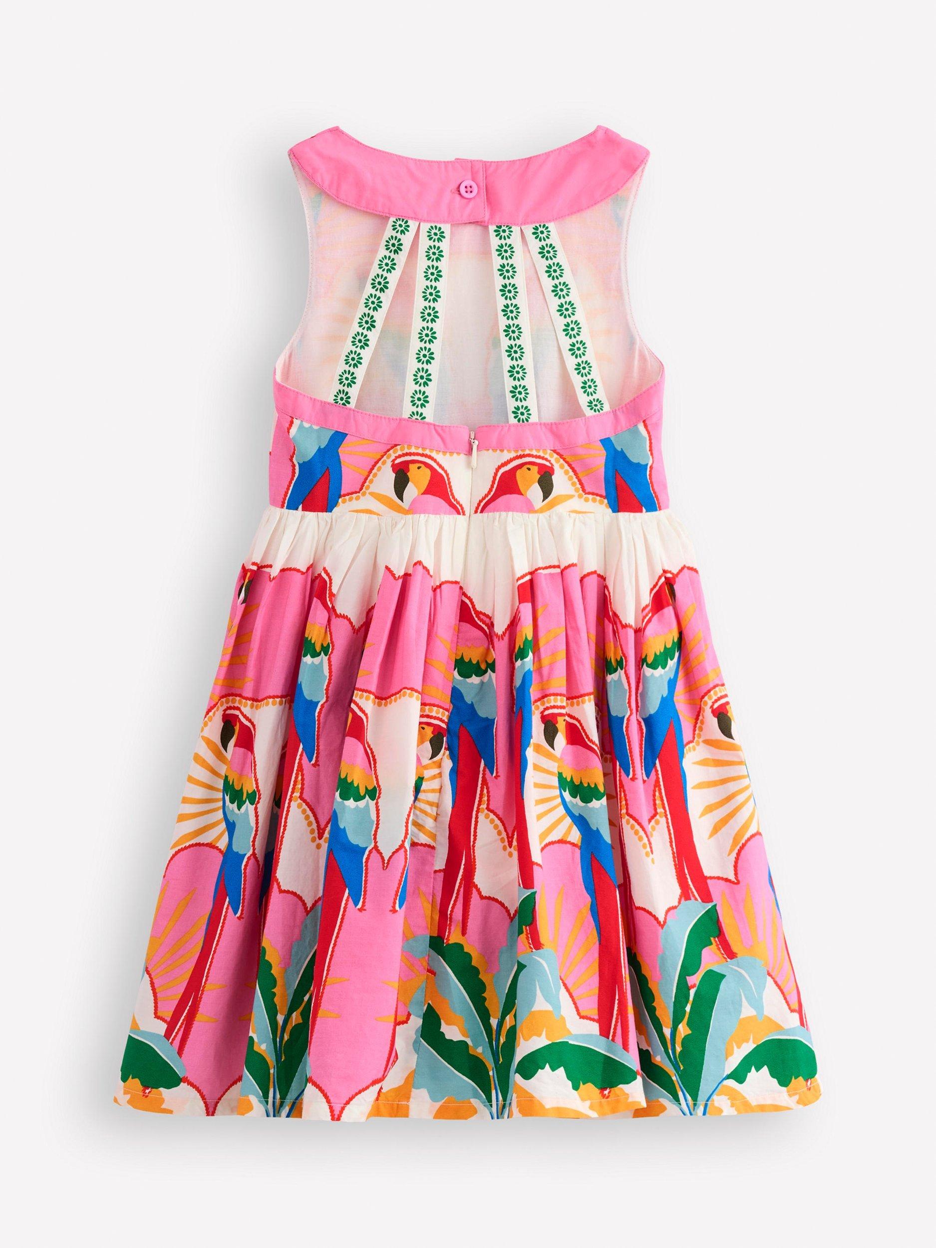 Product image 2 of 3, which shows Mini Boden Kids' Harlow Cotton Back Detail Dress, Multi Parrot, 2-3 years