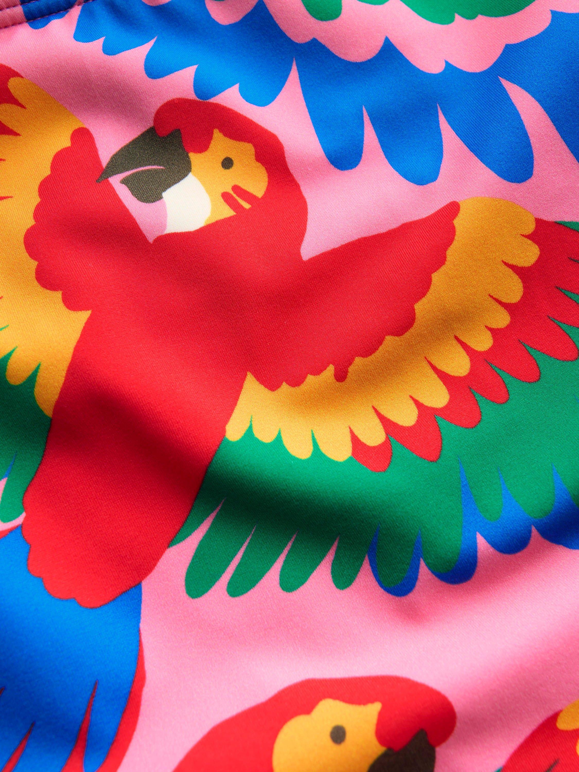 Product image 3 of 3, which shows Mini Boden Kids' Cross-Back Printed Swimsuit, Multi Rainbow Parrot, 3-4 years