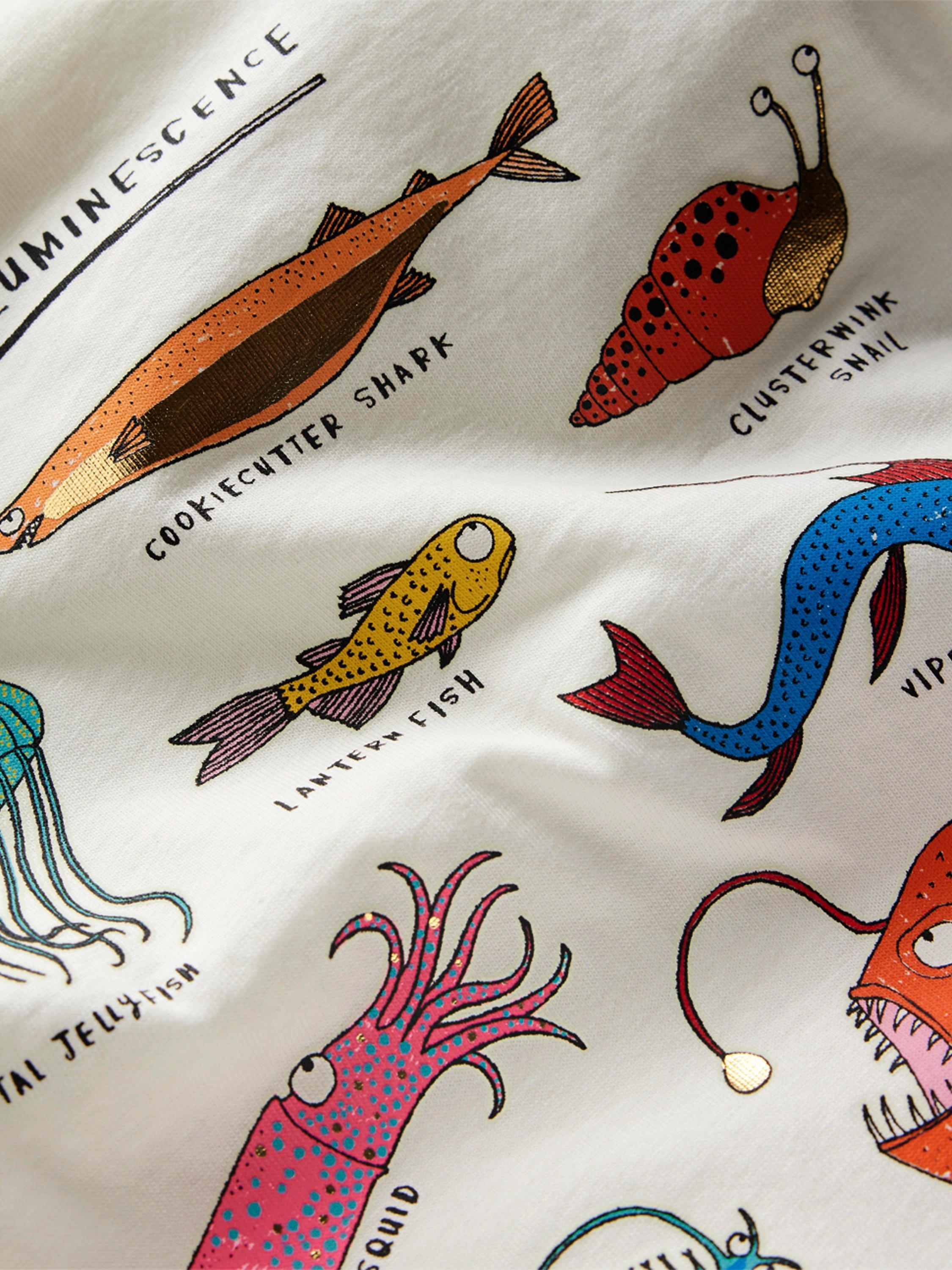 Product image 3 of 3, which shows Mini Boden Kids' Cotton Glow-In-The-Dark T-Shirt, Soft Ivory Bio, 2-3 years
