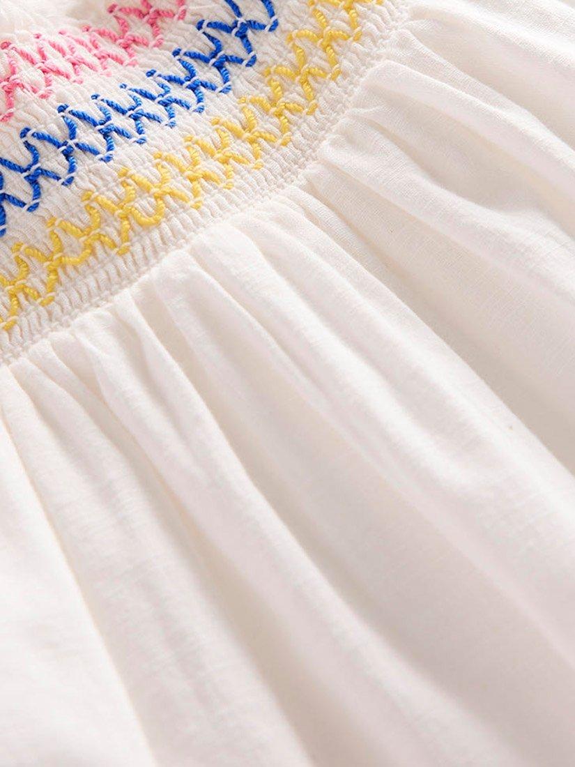 Product image 3 of 3, which shows Mini Boden Kids' Cotton Woven Smocked Top, Soft Ivory, 2-3 years