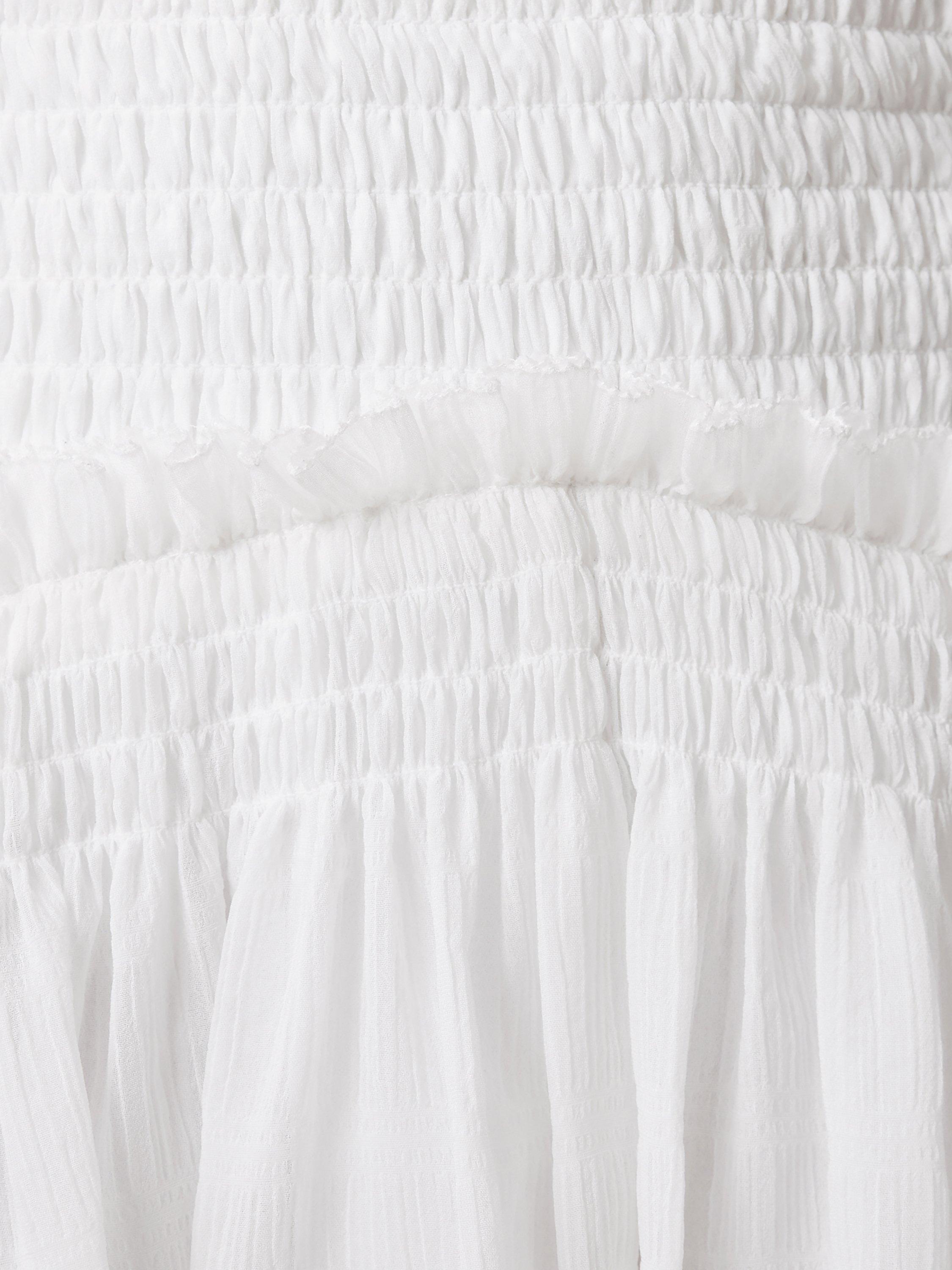 Product image 7 of 8, which shows AllSaints Pamela Asymmetrical Ruffled Hem Mixed Blend Mini Skirt, White, 6