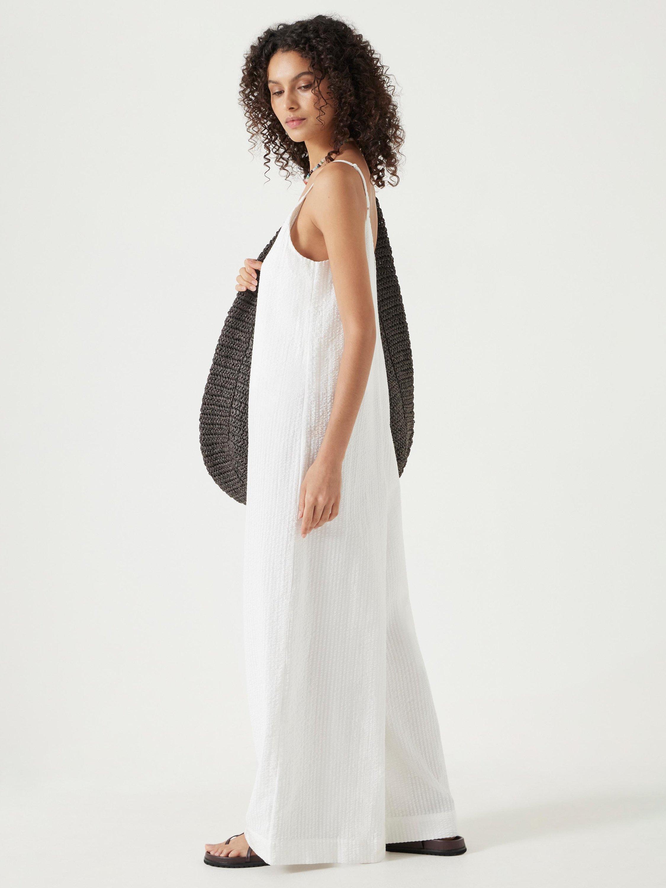 Product image 5 of 6, which shows HUSH Seersucker Cotton Flared Jumpsuit, White, L
