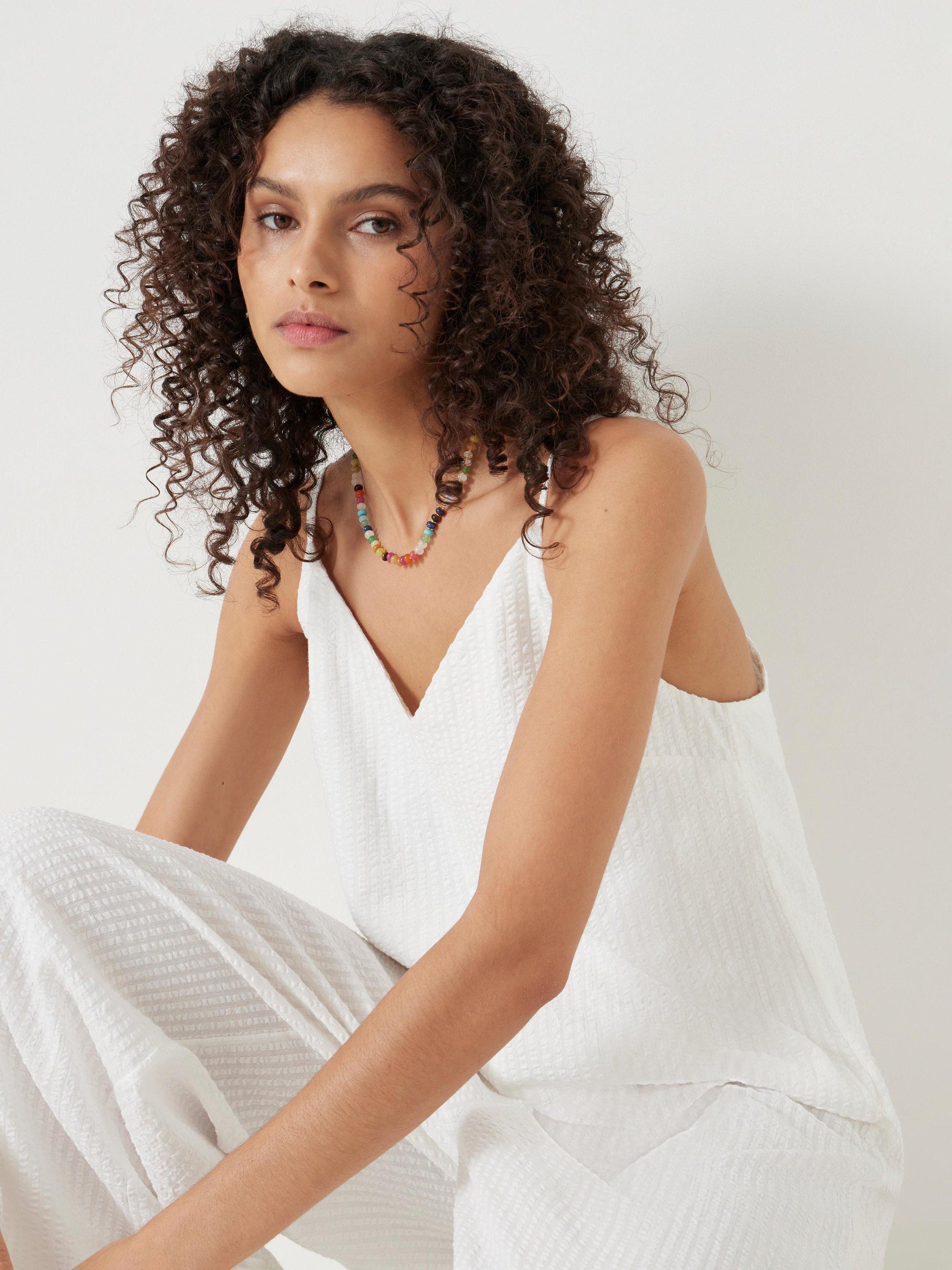Product image 6 of 6, which shows HUSH Seersucker Cotton Flared Jumpsuit, White, L