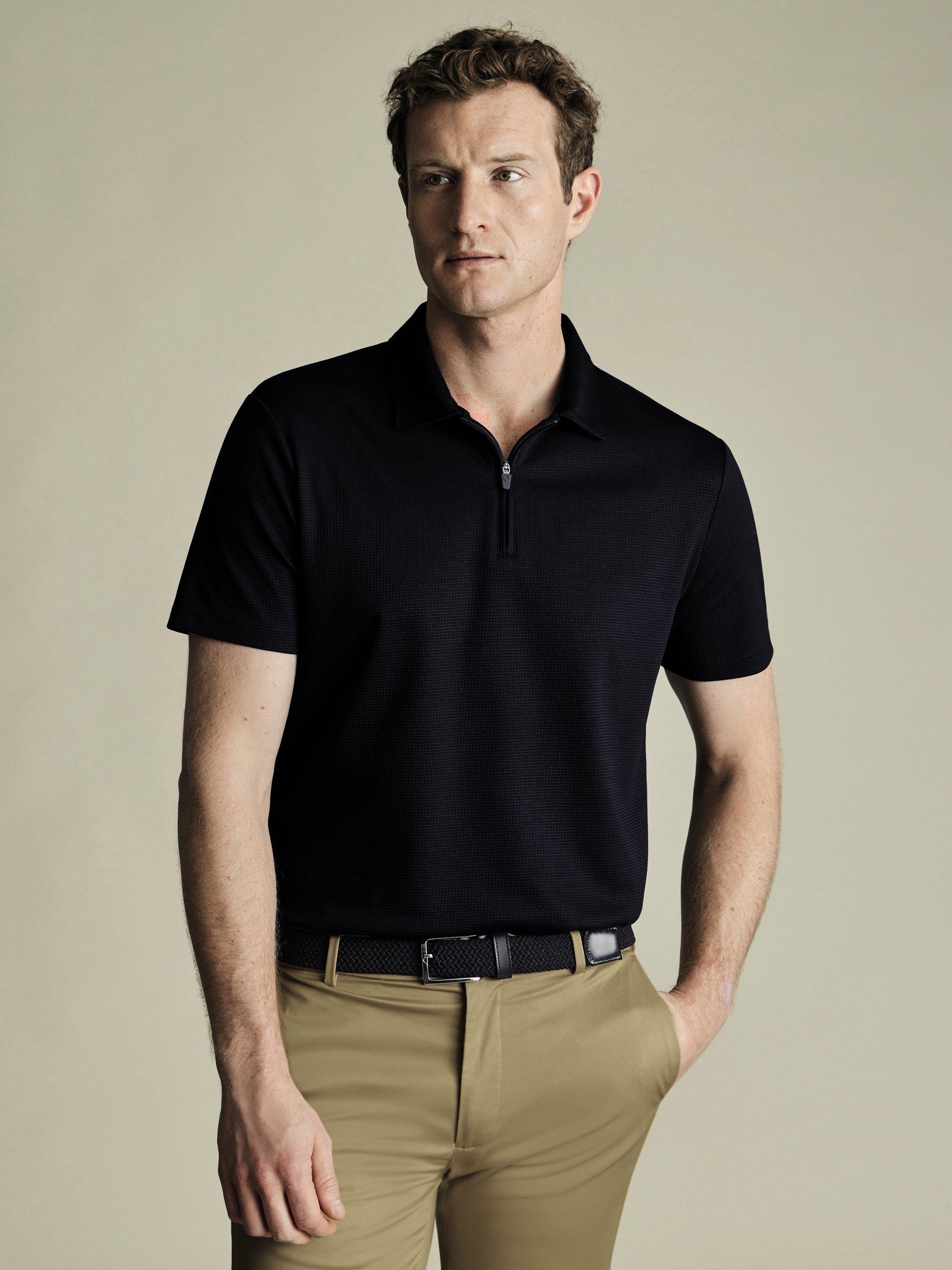Product image 1 of 5, which shows Charles Tyrwhitt Regular Fit Textured Quarter Zip Polo Shirt, Navy, S