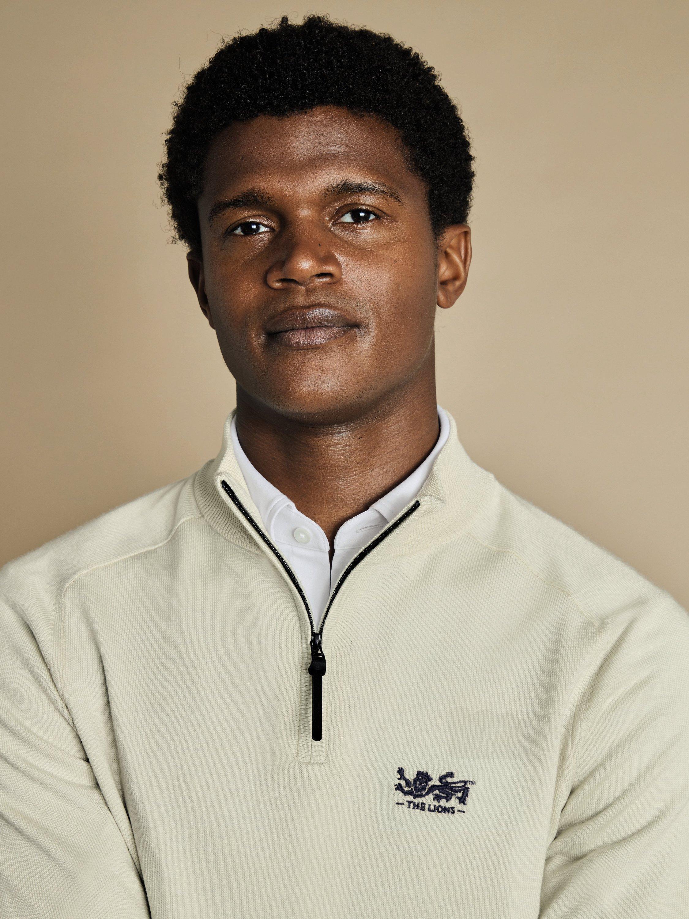 Product image 2 of 5, which shows Charles Tyrwhitt The Lions Merino Wool Half-Zip Fleece Top, Ivory, S
