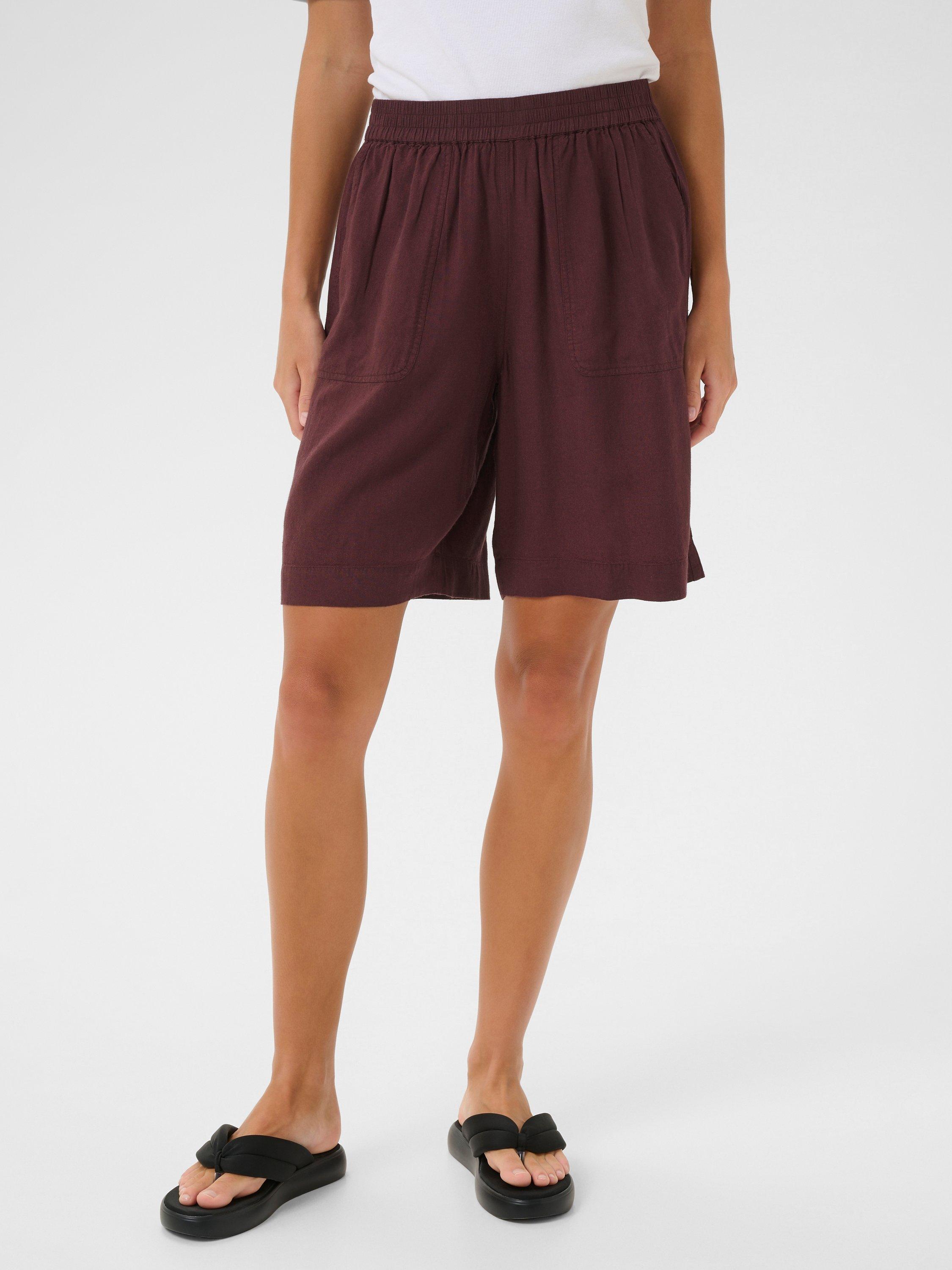 Product image 1 of 6, which shows KAFFE Milia Elasticated Waist Shorts, Mid Red, 8