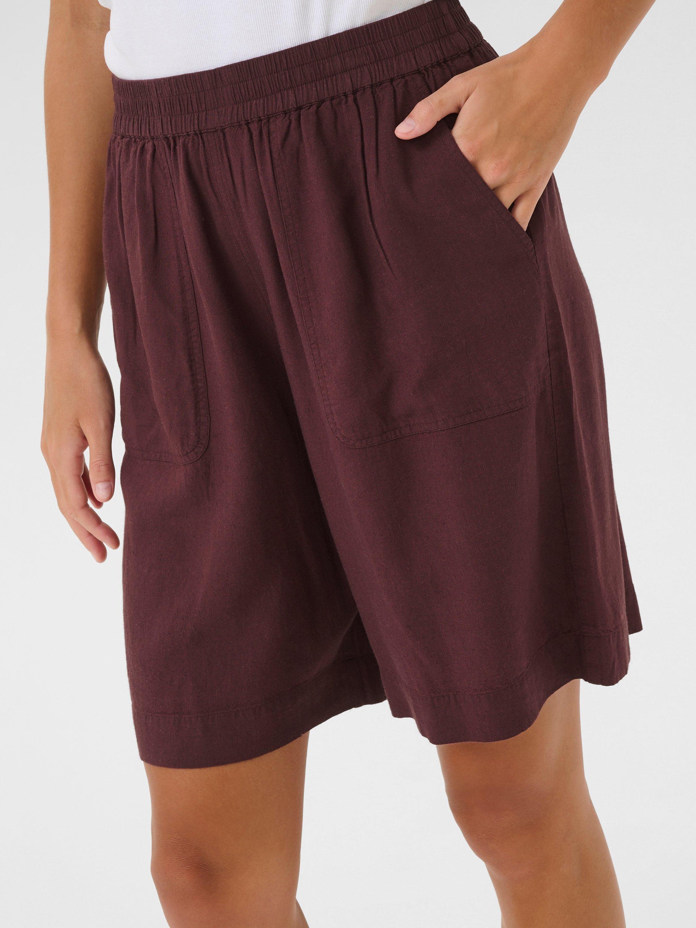 Product image 4 of 6, which shows KAFFE Milia Elasticated Waist Shorts, Mid Red, 8