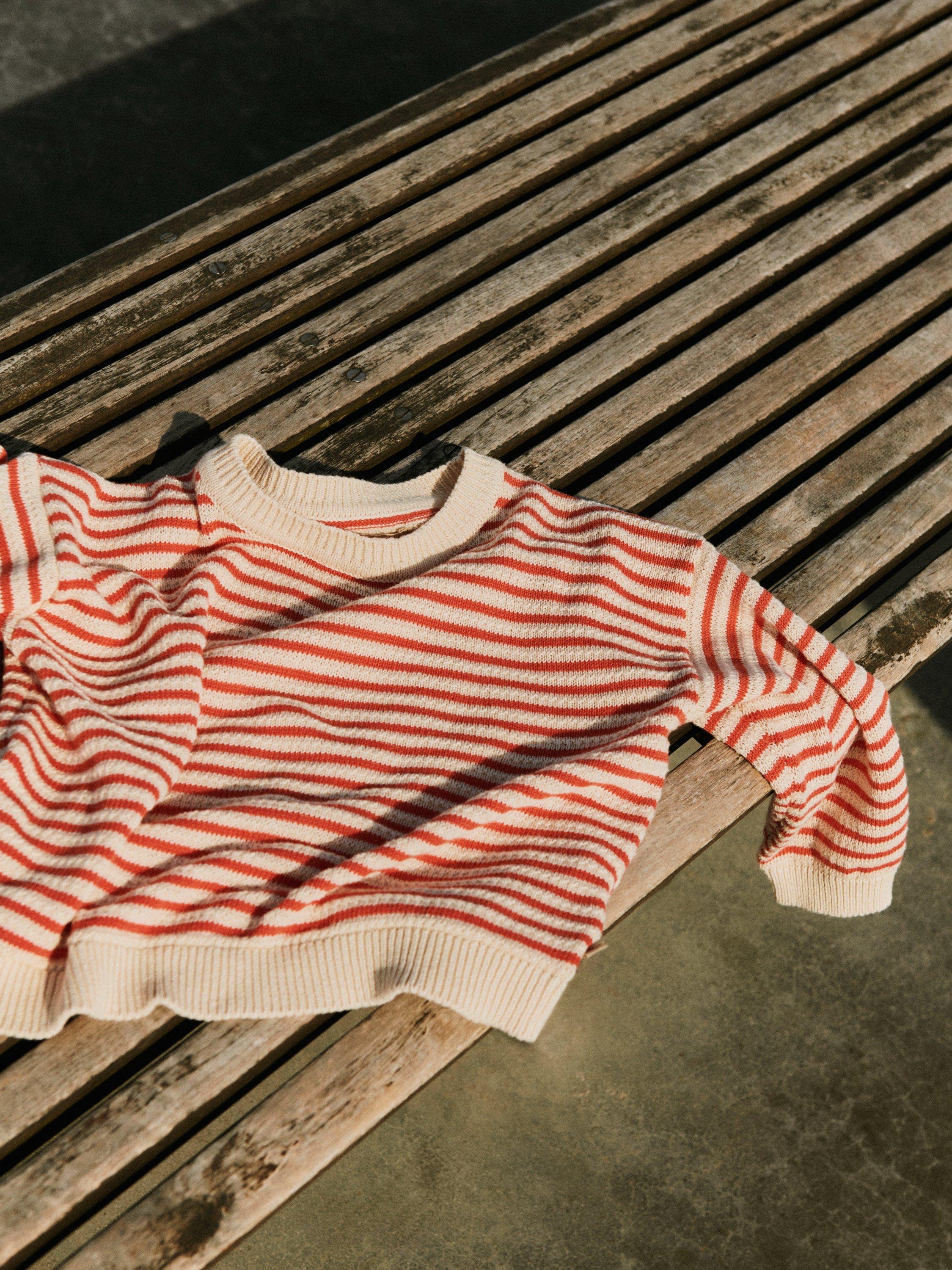 Product image 6 of 6, which shows WHEAT Kids' Leise Knit Stripe Jumper, 2078 Red Stripe, 5 years