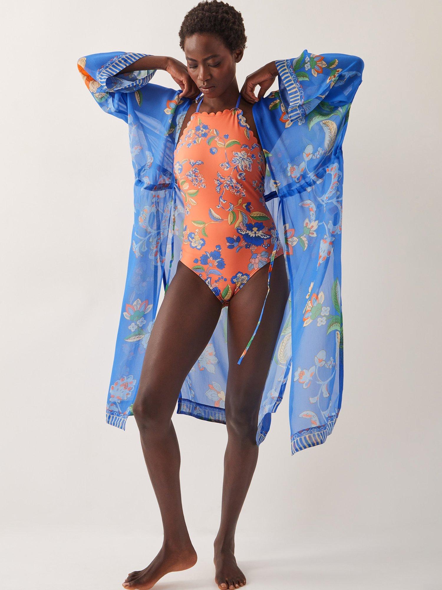 Product image 3 of 5, which shows Monsoon Kaia Floral Scallop Trim Halterneck Swimsuit, Orange/Multi, 8