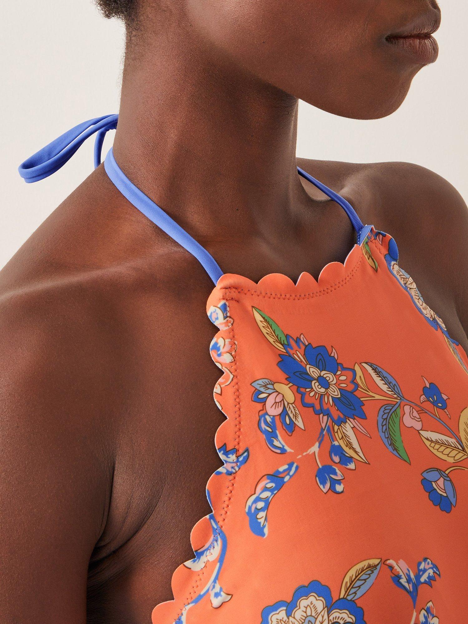 Product image 5 of 5, which shows Monsoon Kaia Floral Scallop Trim Halterneck Swimsuit, Orange/Multi, 8