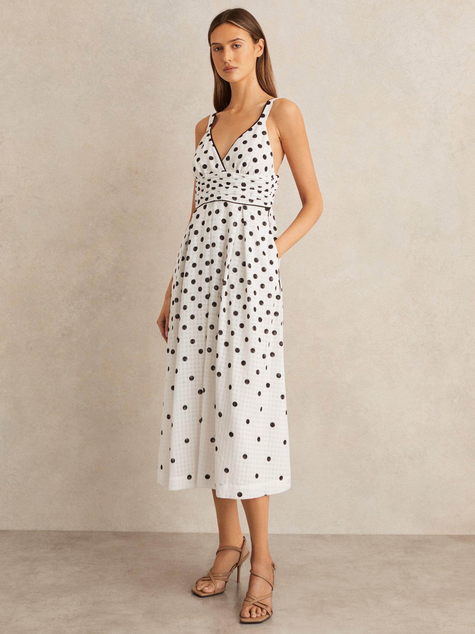 Product image 4 of 5, which shows Reiss Dottie Polka Dot Midi Dress, Black/White, 6