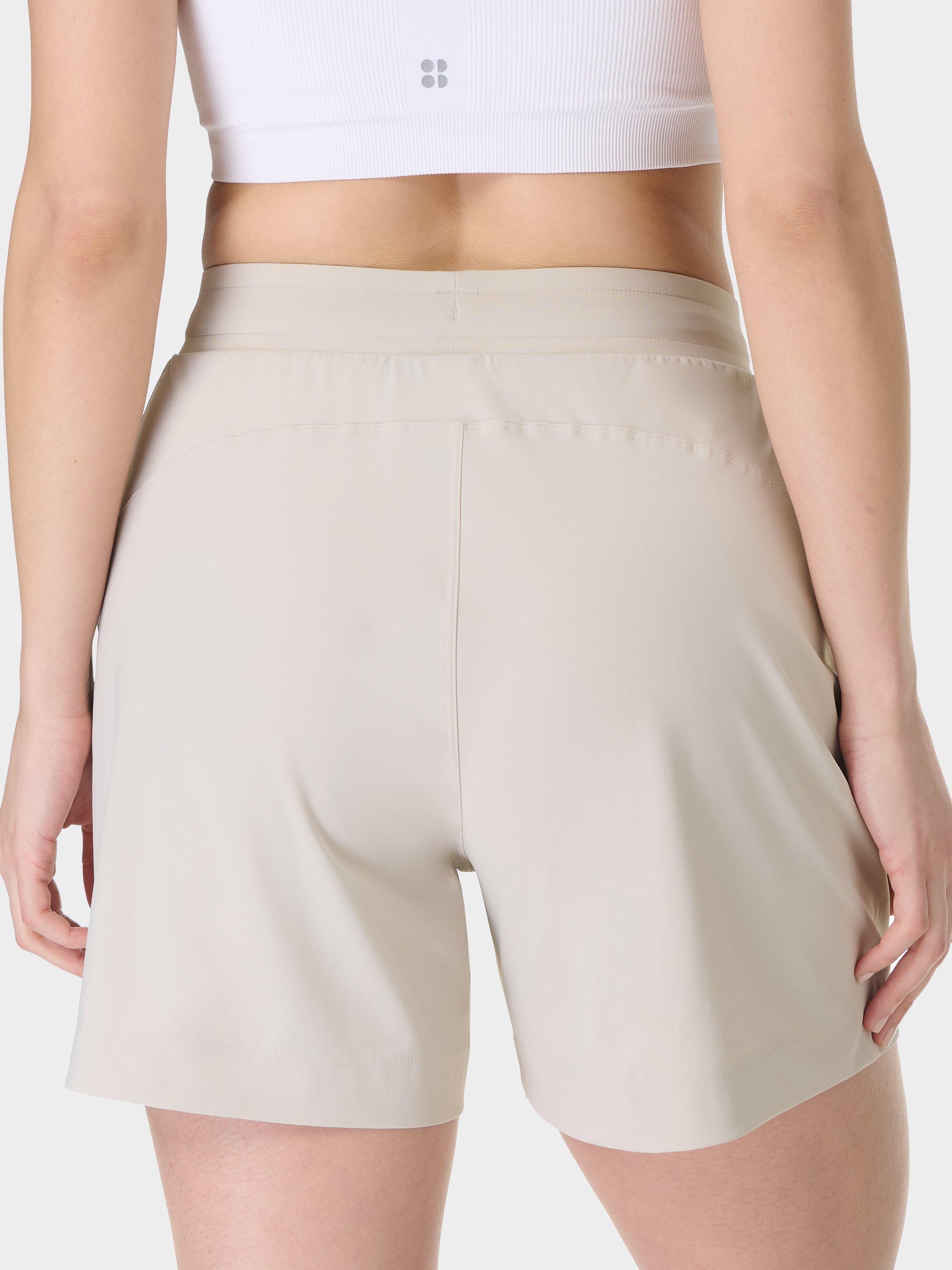 Product image 4 of 6, which shows Sweaty Betty Explorer 5.5" Shorts, Mineral Beige, XXS