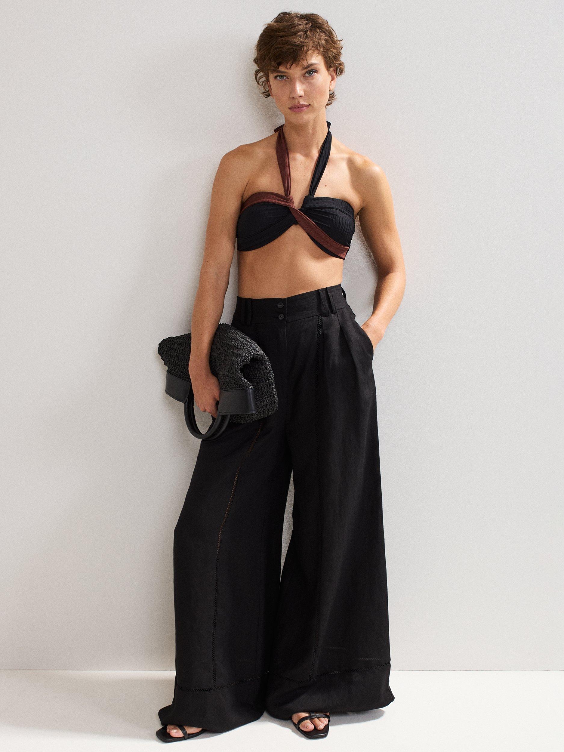 Product image 6 of 6, which shows Phase Eight Colour Block Halterneck Bikini Top, Black, 8