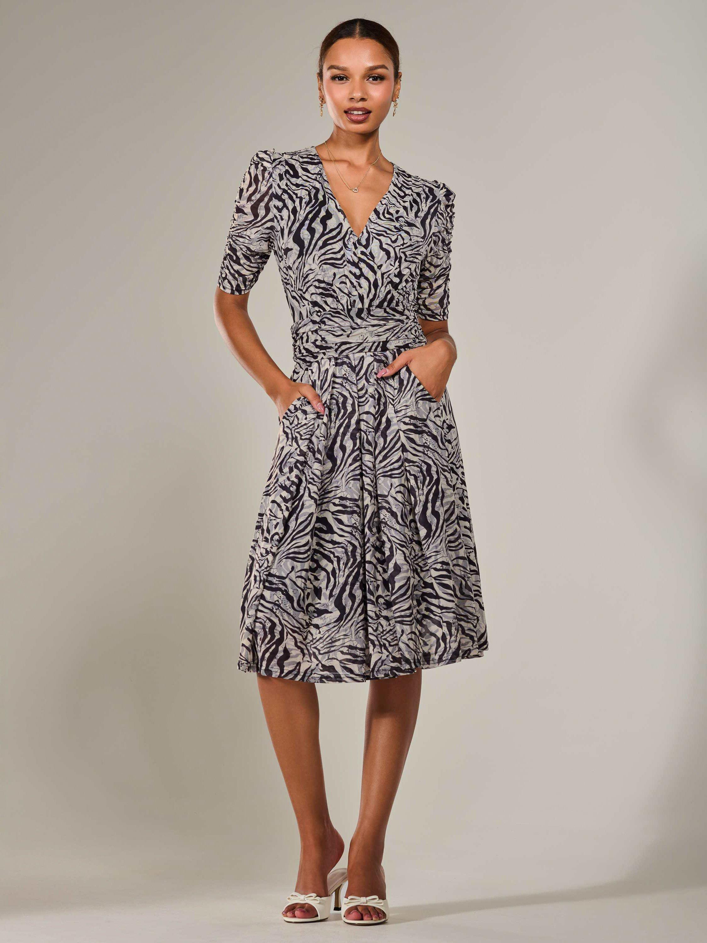 Product image 1 of 7, which shows Jolie Moi Ruched Wrap Style Animal Print Midi Dress, Grey/Black, 8