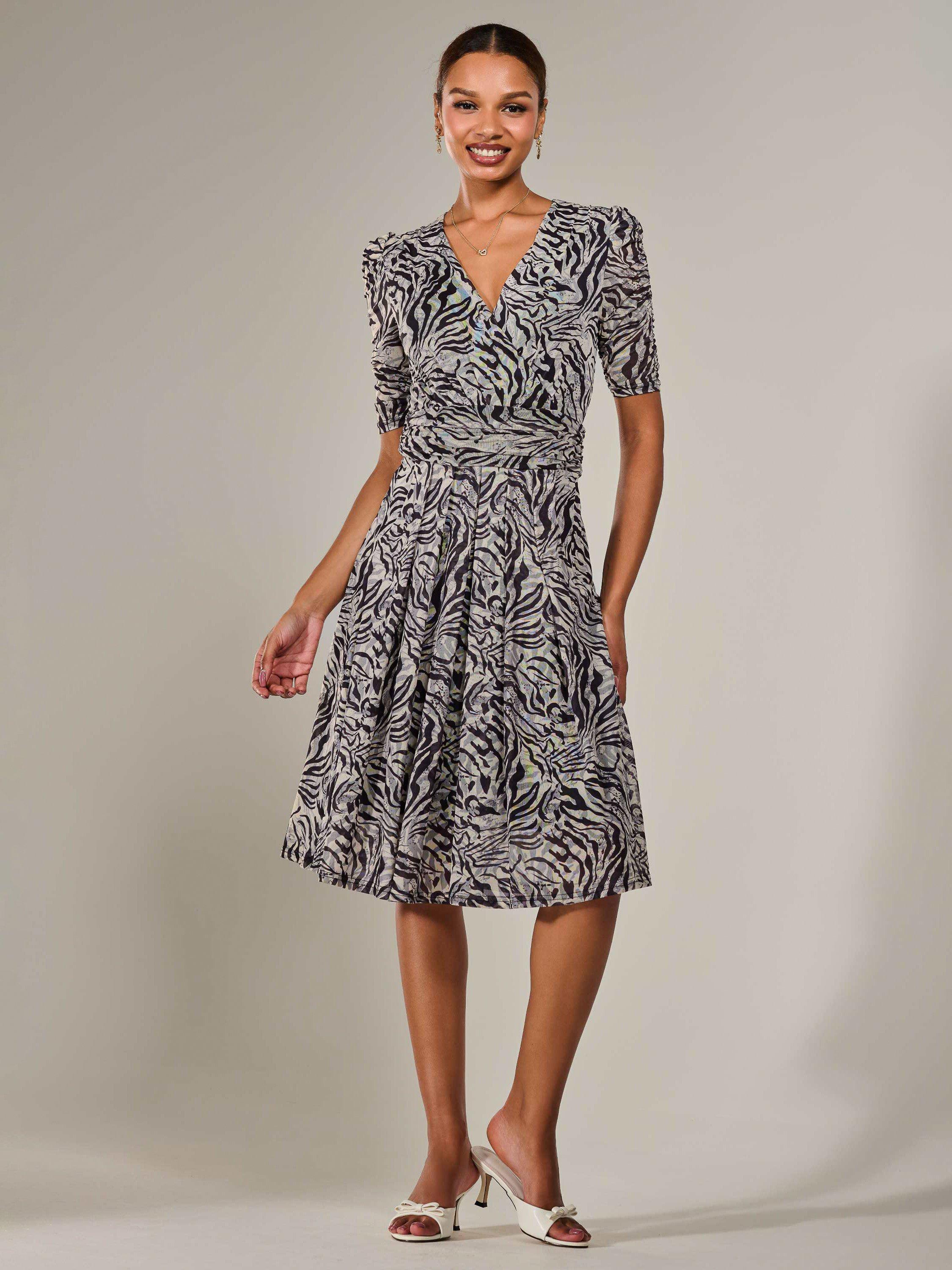 Product image 6 of 7, which shows Jolie Moi Ruched Wrap Style Animal Print Midi Dress, Grey/Black, 8