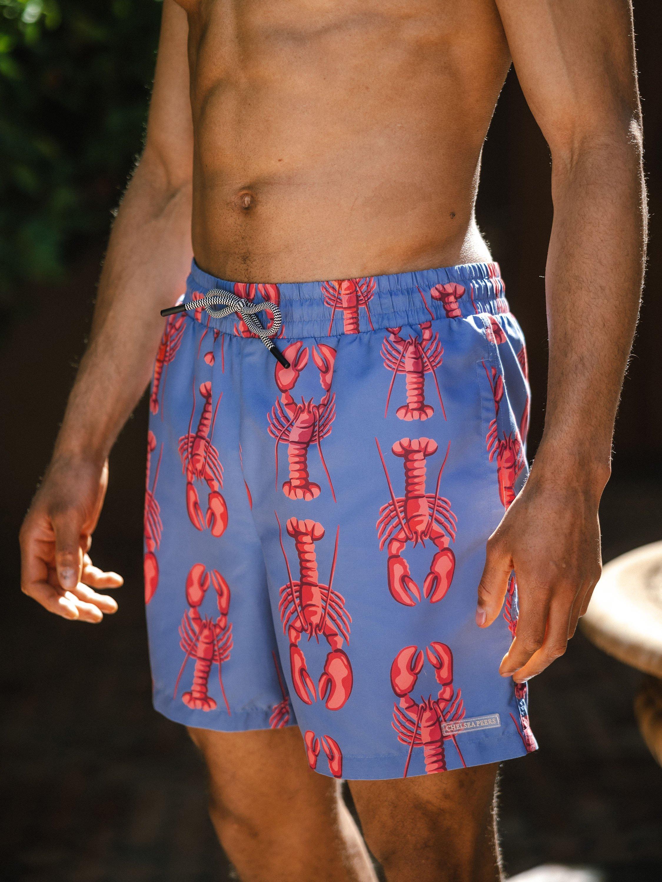 Product image 3 of 6, which shows Chelsea Peers Lobster Print Swim Shorts, Blue/Multi, L