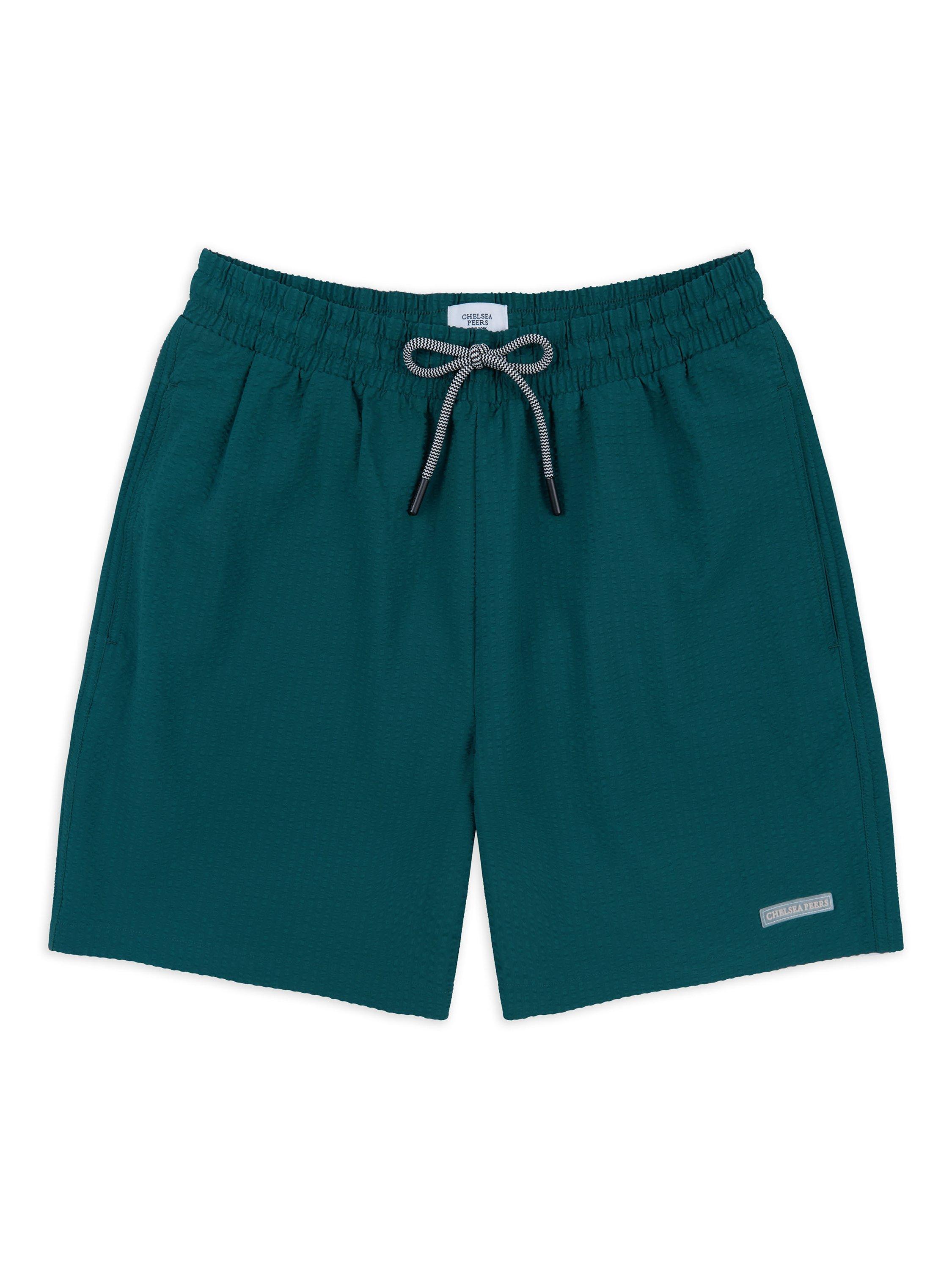 Product image 1 of 3, which shows Chelsea Peers Plain Swim Shorts, Navy, S