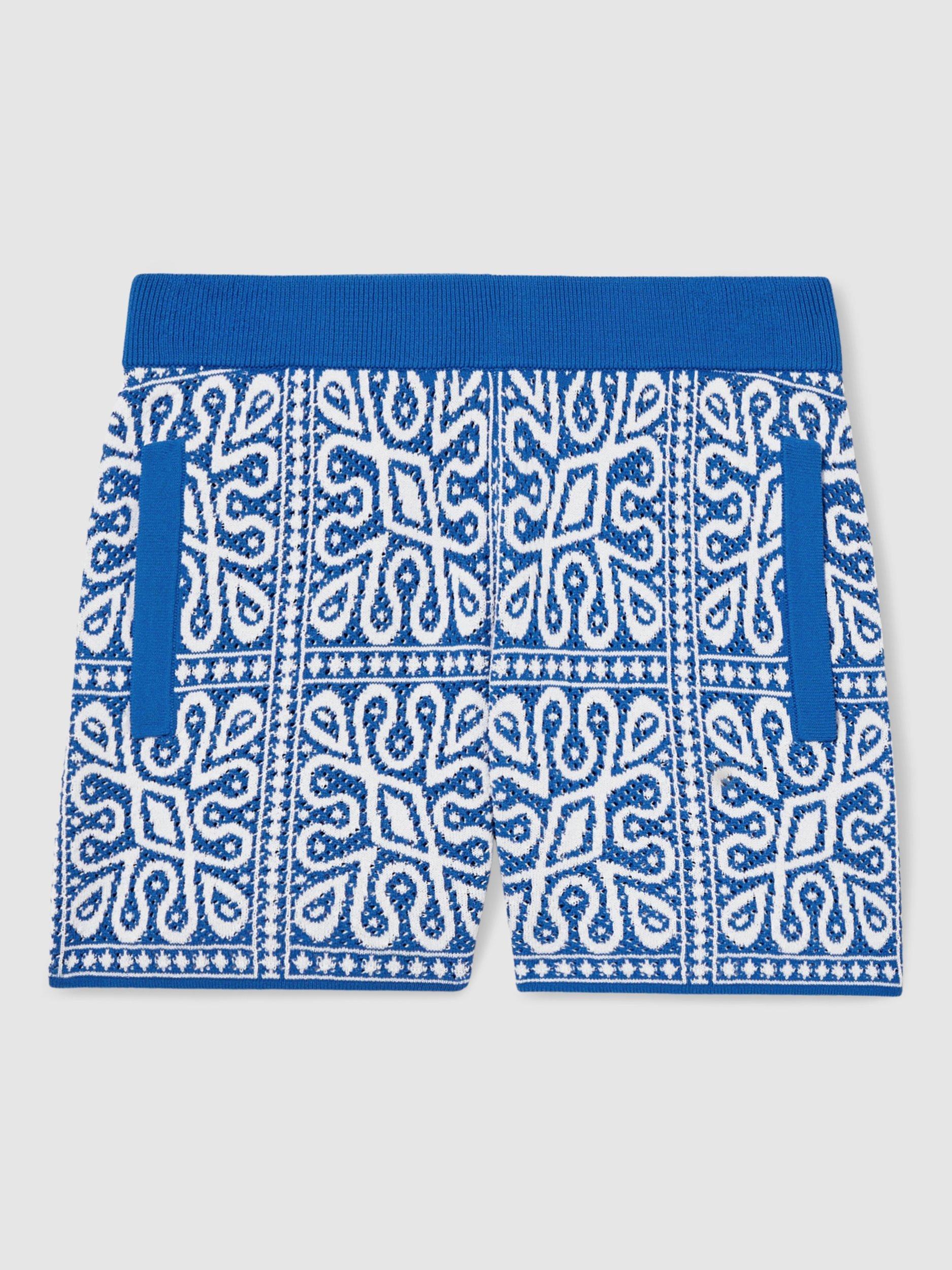 Product image 1 of 4, which shows Reiss Kids' Redhill Tile Print Knitted Shorts, Blue/White, 4-5 years