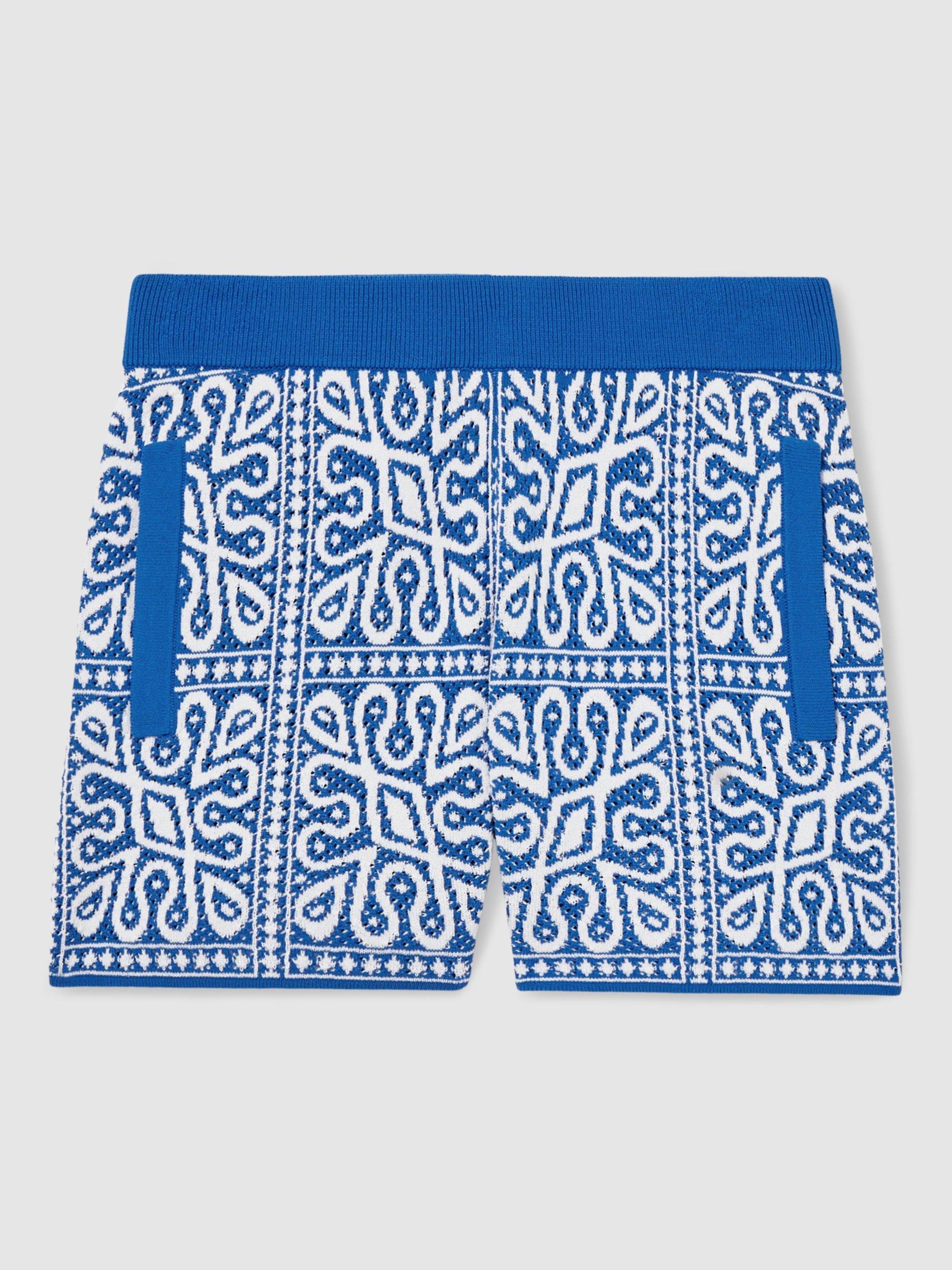 Product image 2 of 4, which shows Reiss Kids' Redhill Tile Print Knitted Shorts, Blue/White, 4-5 years